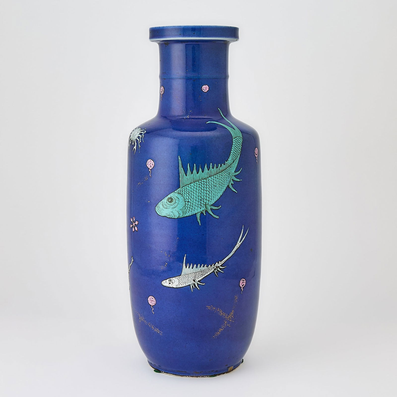 A Chinese Blue Ground Enameled Porcelain 'Fishes' Rouleau Vase Qing Dynasty: Decorated with a variety of colorful aquatic creatures over a blue ground. (Height 18 inches)