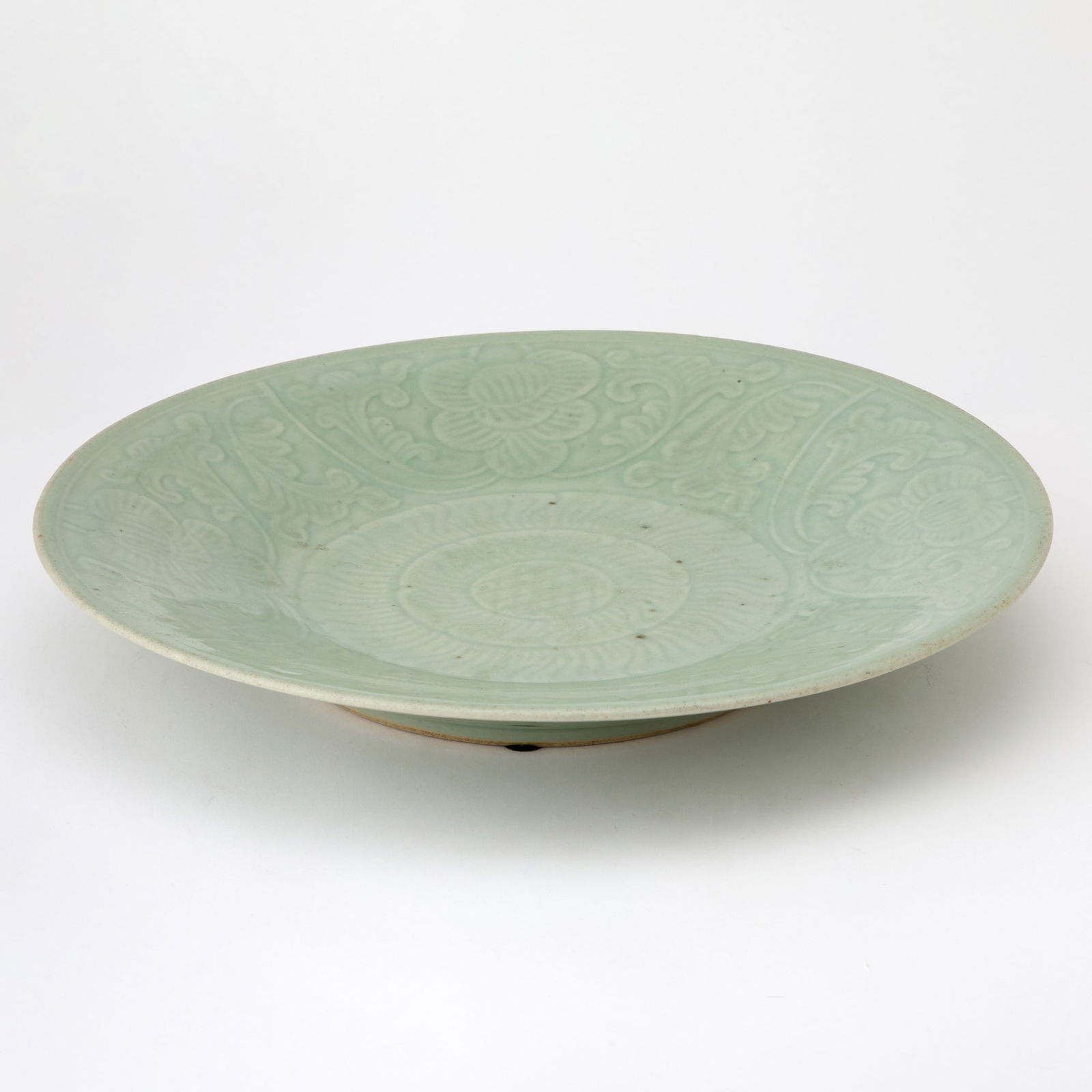 A Chinese Celadon Glazed Carved Porcelain Charger Qing Dynasty (1 of 5)