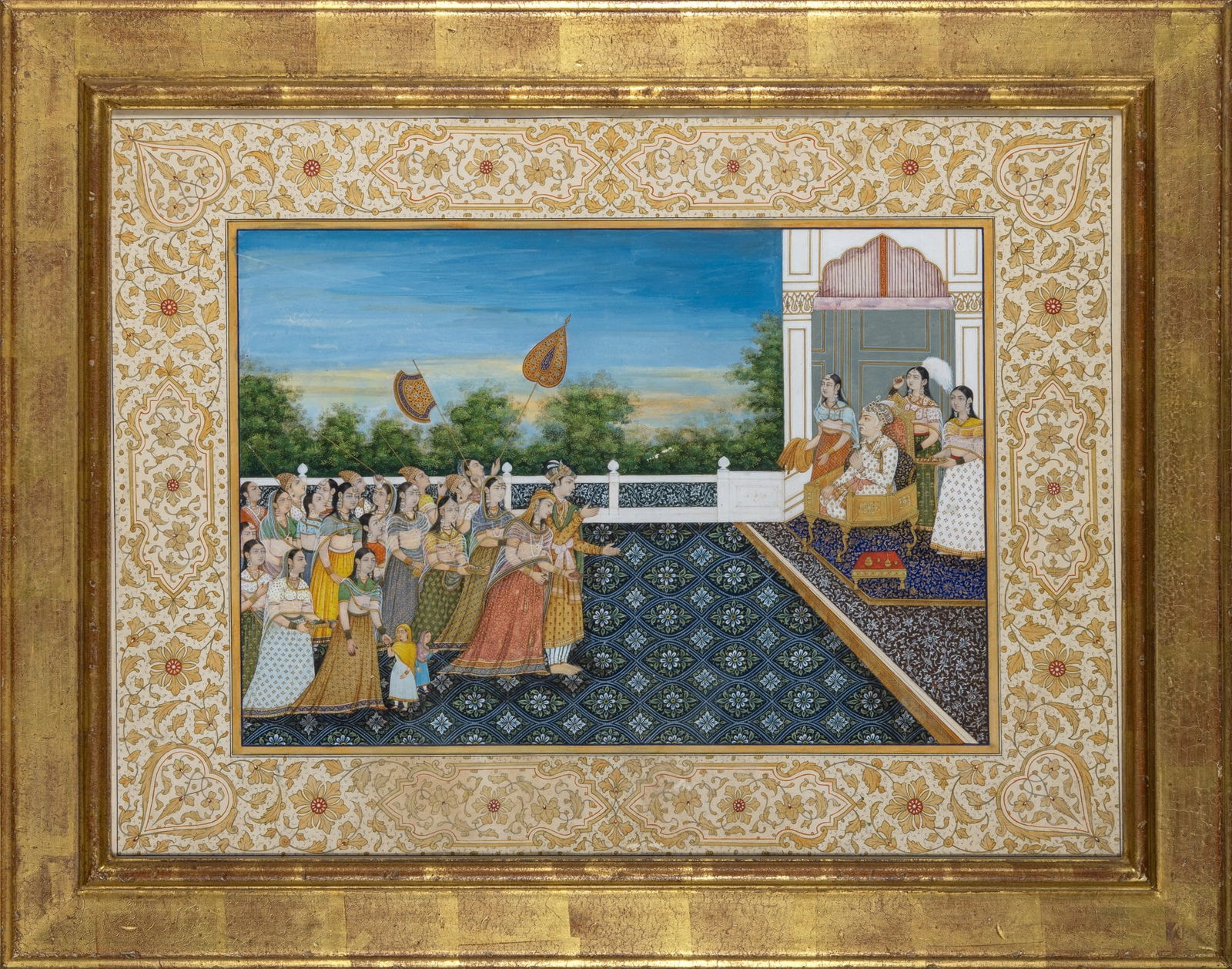 A Large and Fine Indian Deccan School Painting 19th century: Gouache and gold leaf on paper; depicting a court scene within wide floral border; framed. (Sight 25 1/4 x 18 3/4 inches)