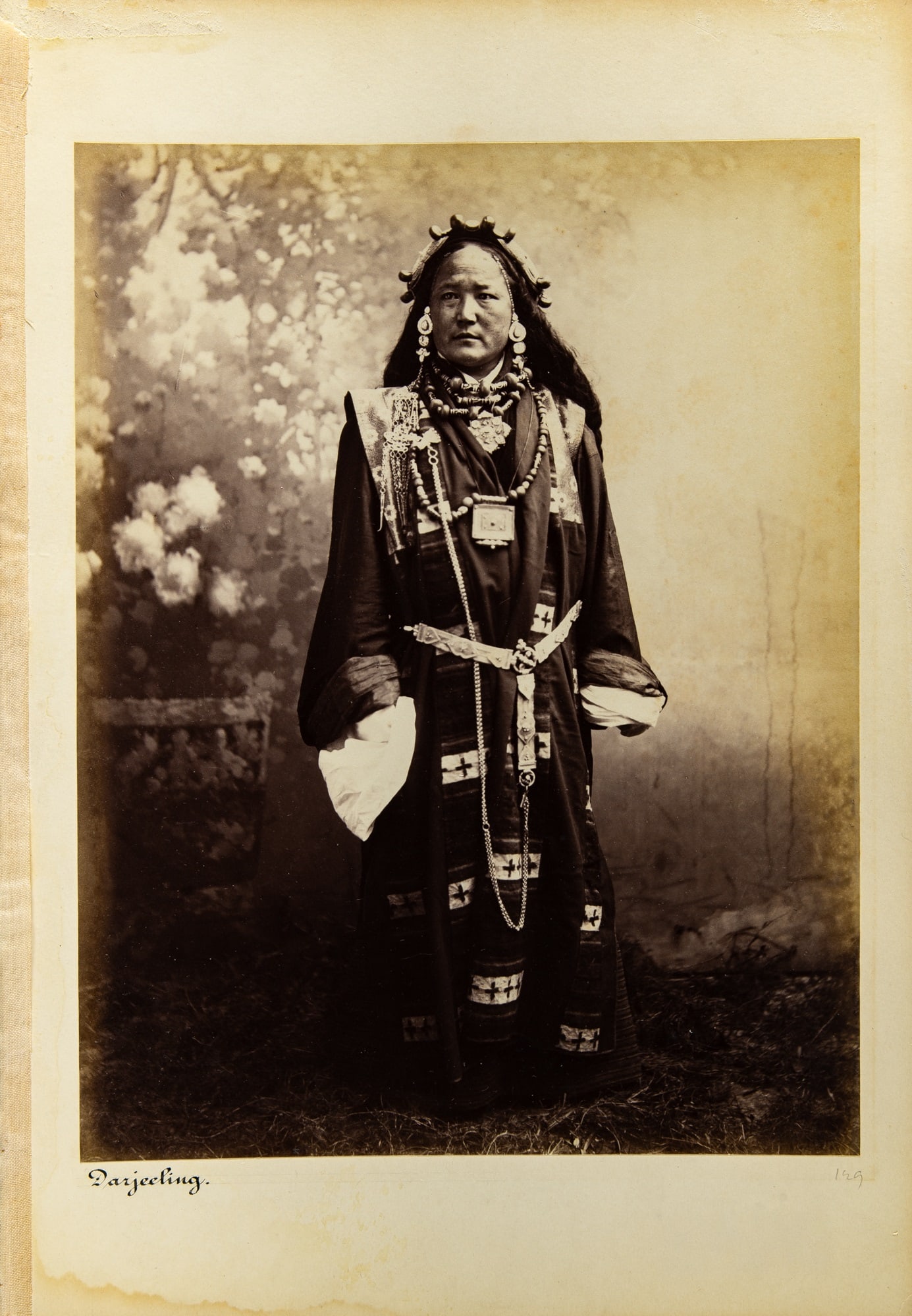 A Tibetan Subject Photograph by Theodor Paar Darjeeling, circa 1890: Albument print depicting prominent Sikkimese / Tibetan Darjeeling resident Ani Chokyi in traditional attire. (Image 8 x 10 3/4 inches)