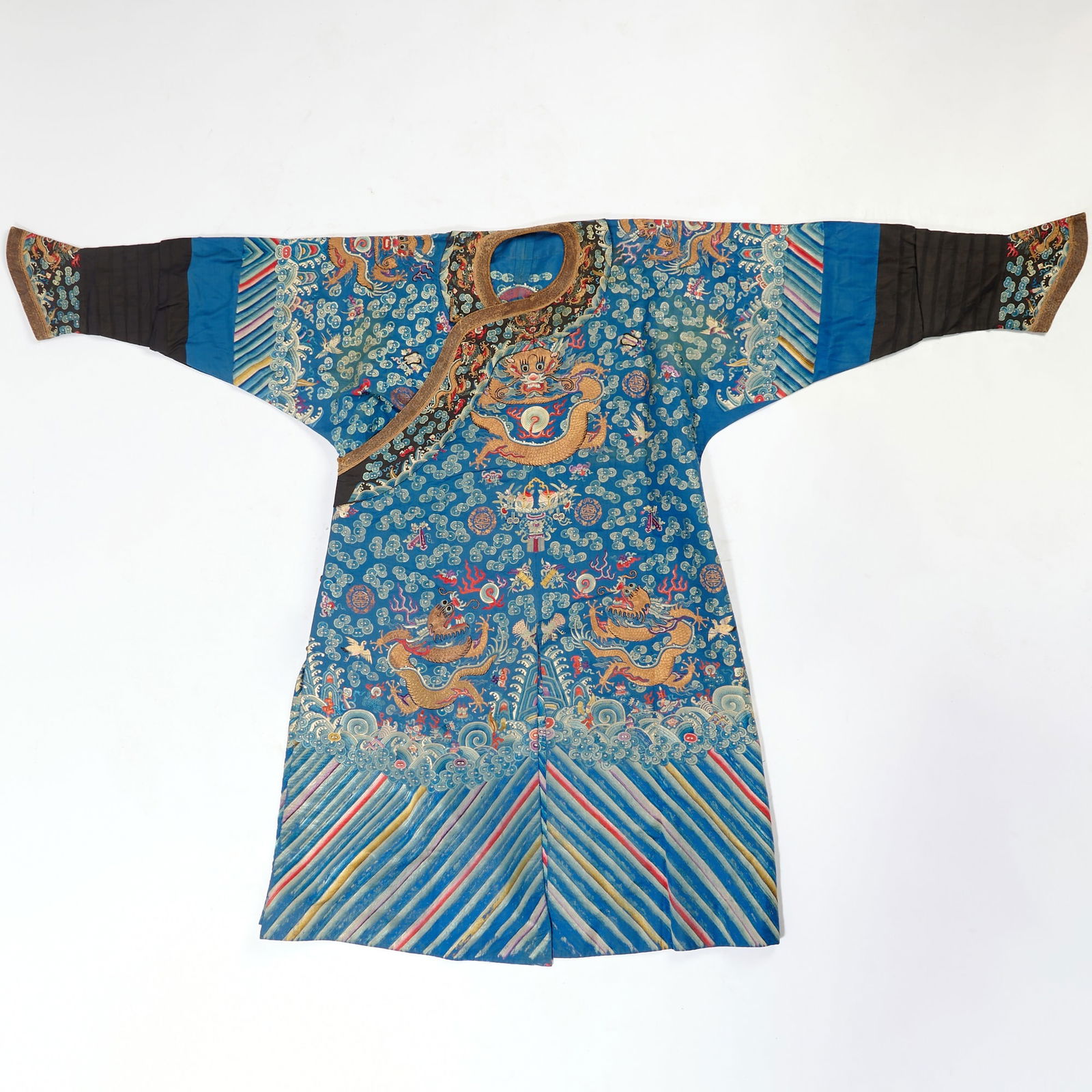 A Chinese Blue Ground Embroidered Silk 'Dragon' Robe Late Qing Dynasty (1 of 6)