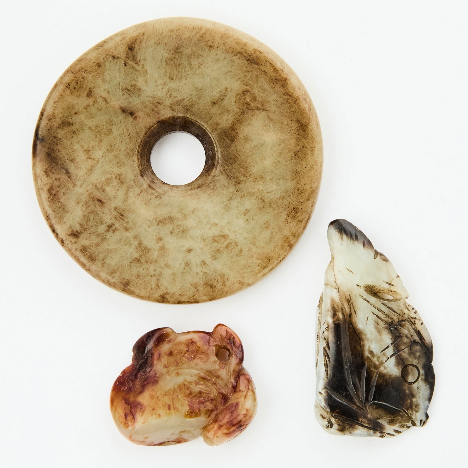 A Group of Chinese Mottled Jade Carvings Ming Dynasty or earlier (1 of 2)