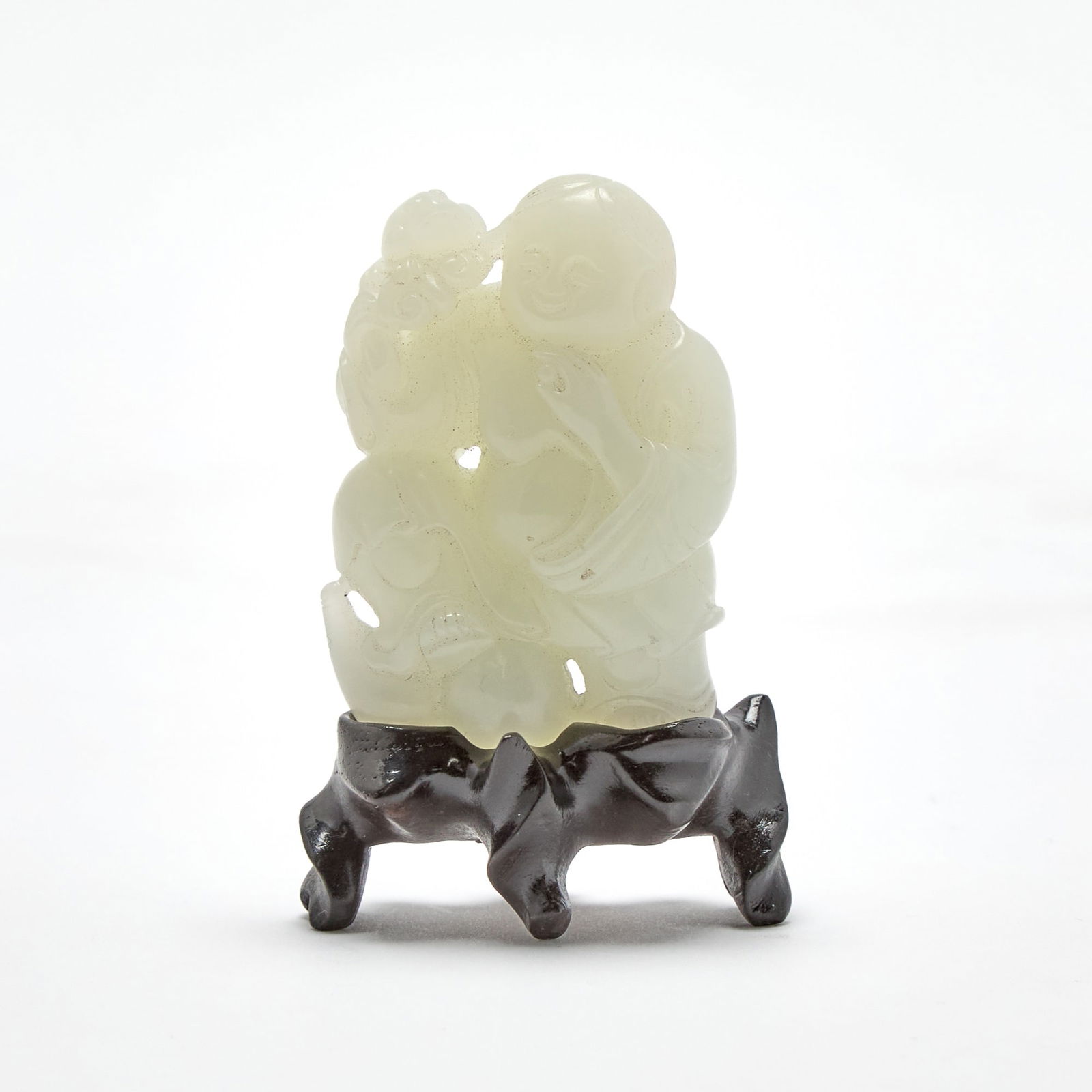 A Chinese Pale Celadon Jade Figural Carving of Liu Hai Qing Dynasty (1 of 3)