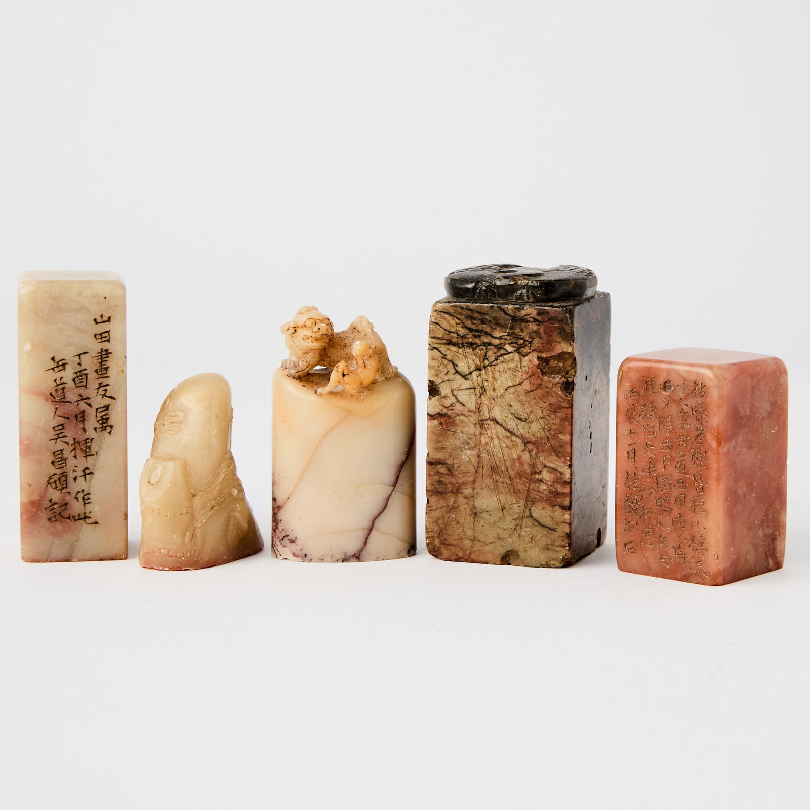 Five Chinese Soapstone Seals Qing Dynasty: Of varying sizes and styles. (Height of largest 2 3/4 inches)