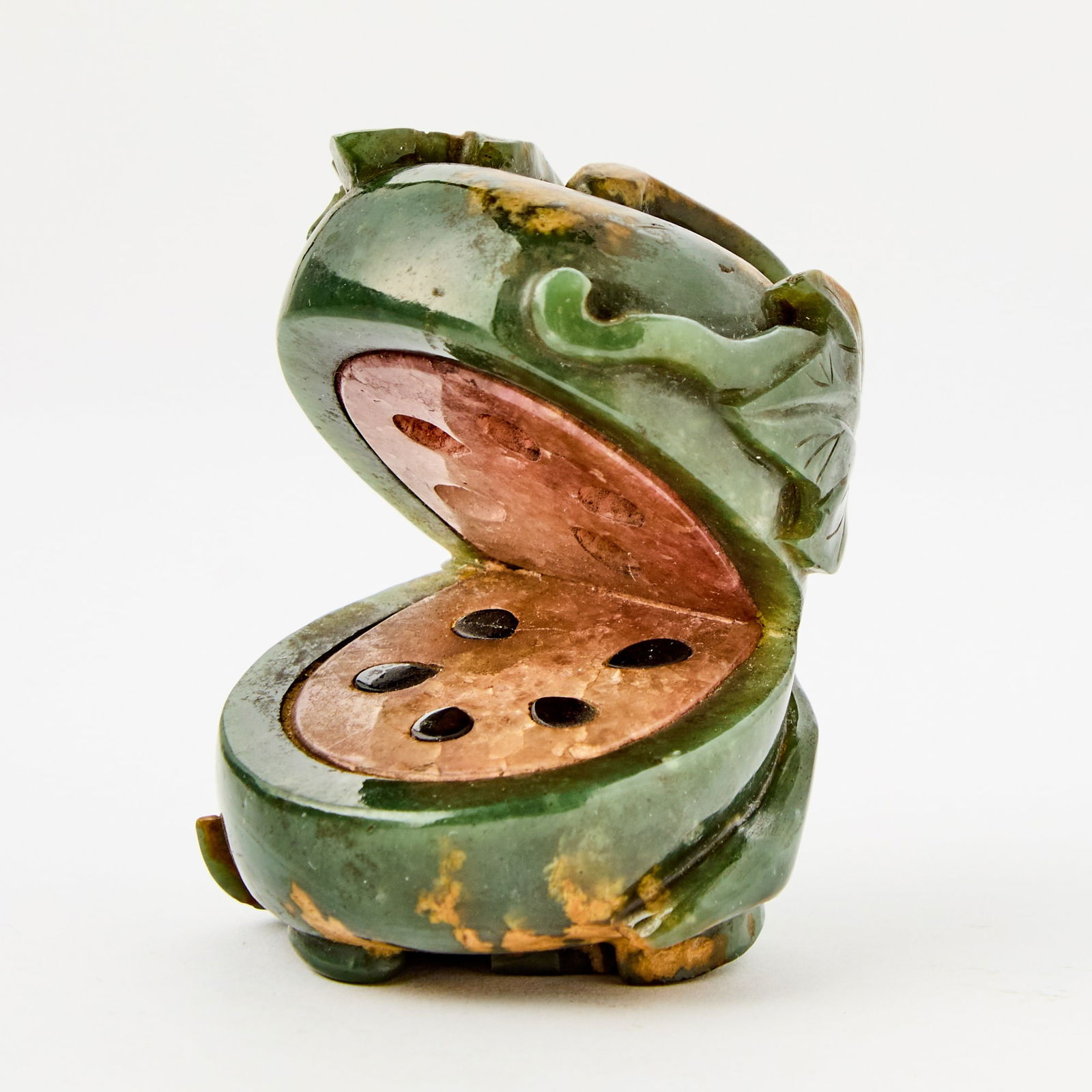 An Unusual Chinese Mixed Hardstone Carving of a Watermelon Likely Republic Period: The watermelon carved with leafy tendrils to exterior. (Height 3 inches)