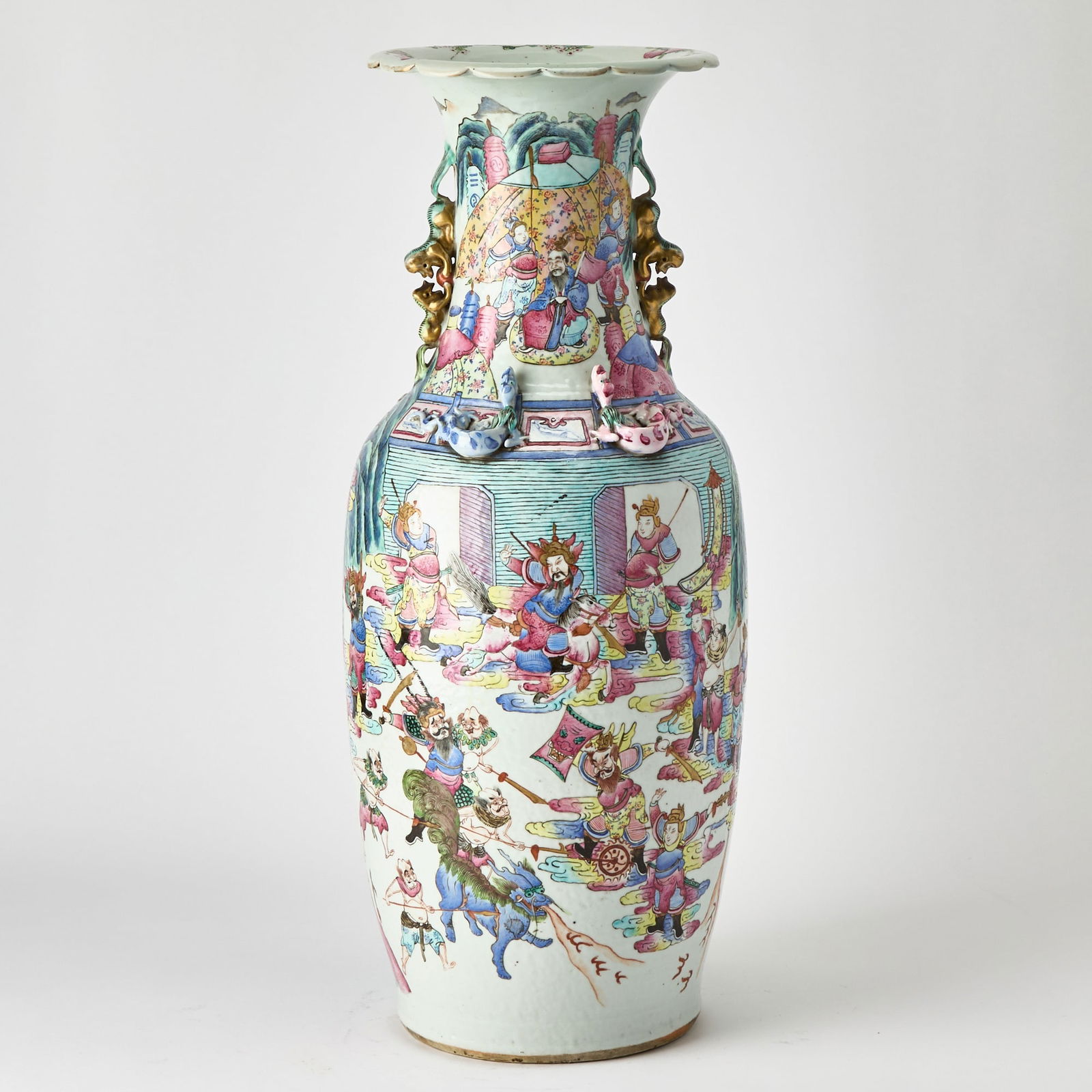 A Large Chinese Famille Rose Porcelain Vase Late Qing Dynasty: The ovoid boy rising to a trumpet neck flanked by a pair of molded chilong handles; decorated to exterior with a continuous figural scene. (Height 25 inches)