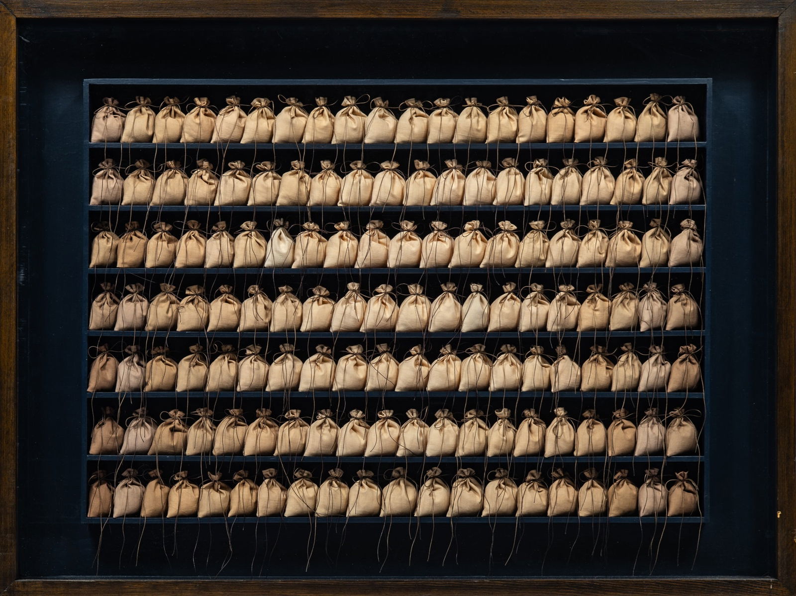 Rosamond Berg: American, 1931-2018 Forest Dust II Inscribed Rosamond Berg and as titled on the frame Mixed media with fabric sacks and string Overall 24 x 32 x 3 1/2 inches (61 x 81.3 x 8.9 cm)