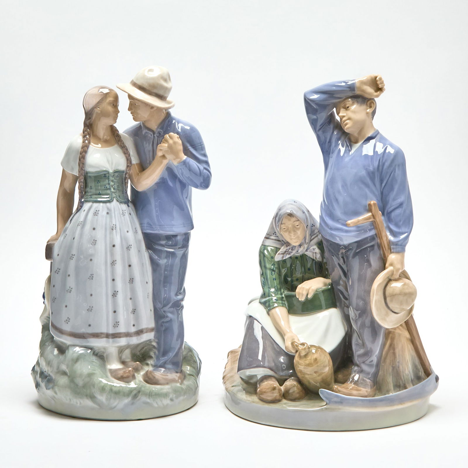 Two Royal Copenhagen Porcelain Figural Groups: Heights 17 1/2 inches.