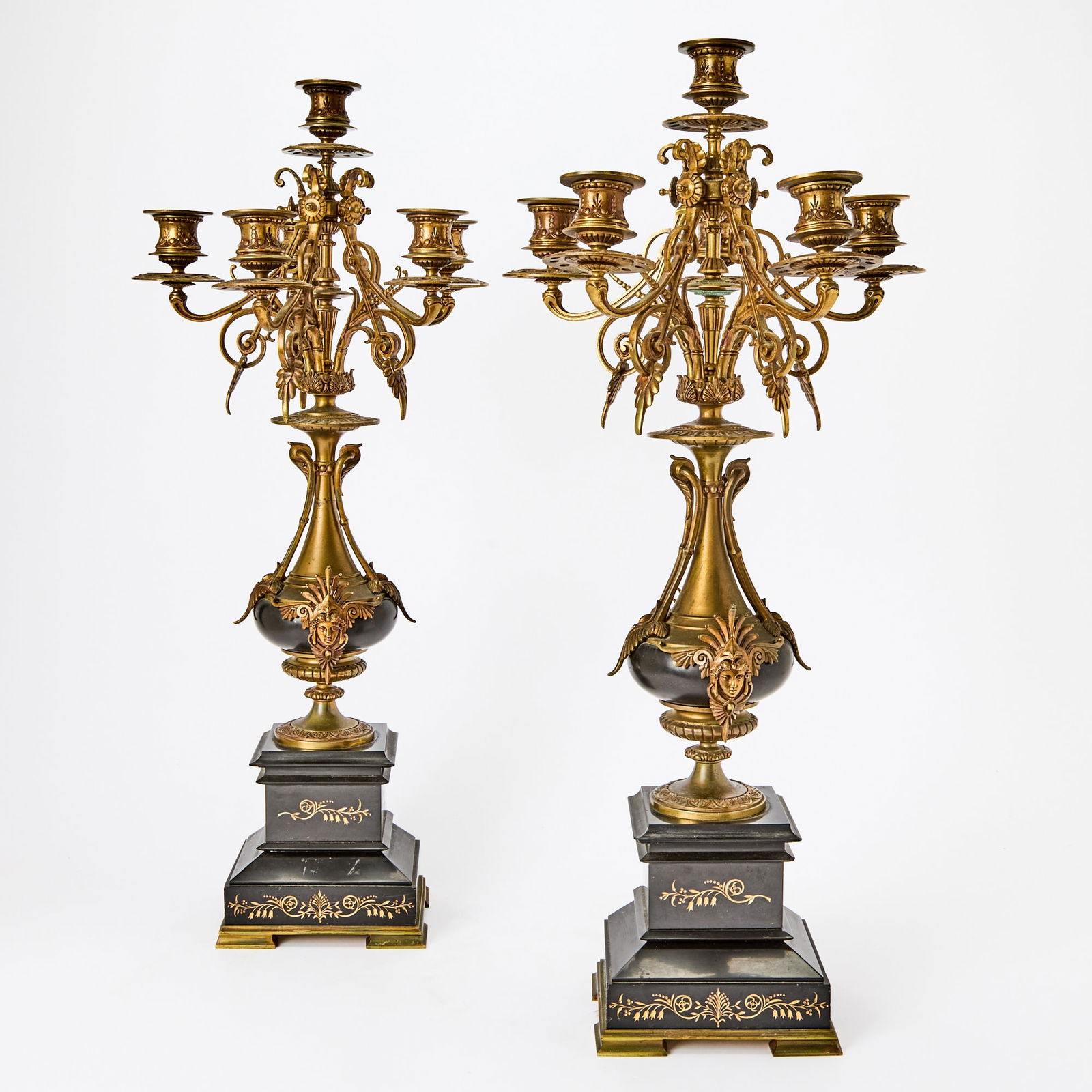 Pair of Patinated Bronze and Marble Six-Light Candelabra: Circa 1900Height 25 1/2 inches, diameter 12 inches.