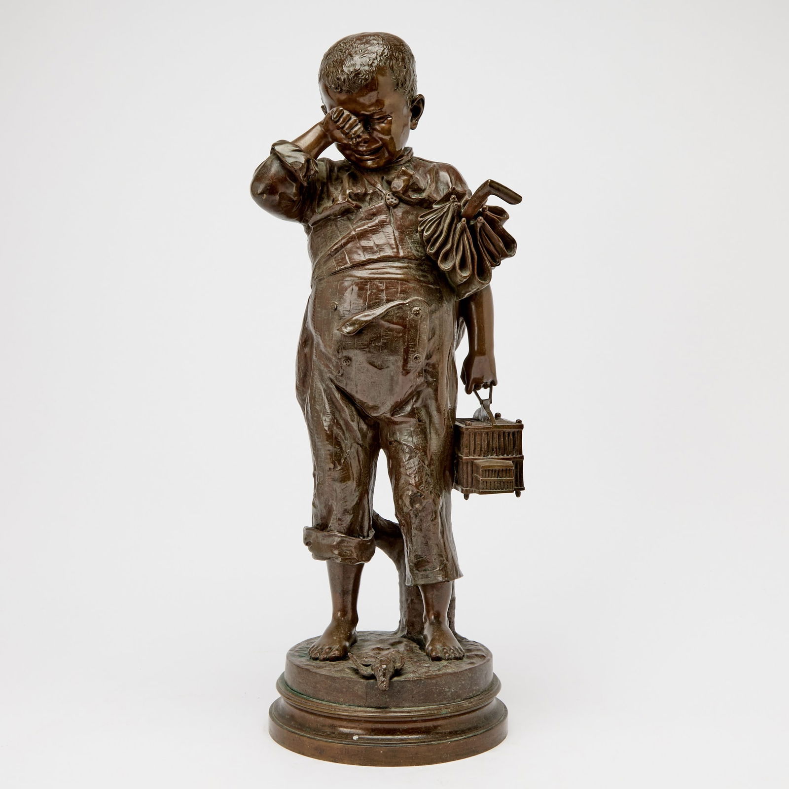 Patinated Bronze Figure of a Boy with Umbrella: Height 22 inches.