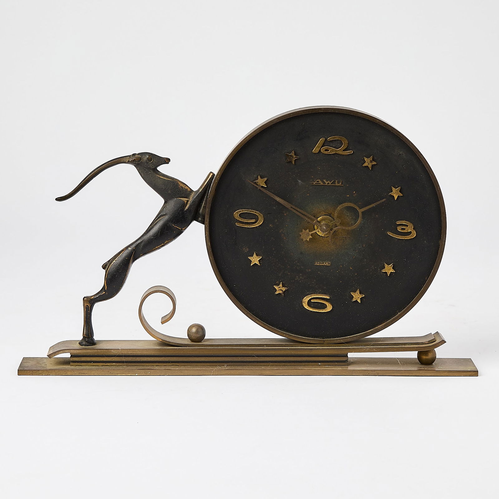 Dutch Bronze Impala Table Clock: AWU, Leiden, circa 1950 Height 7 1/4 inches, length 11 inches.