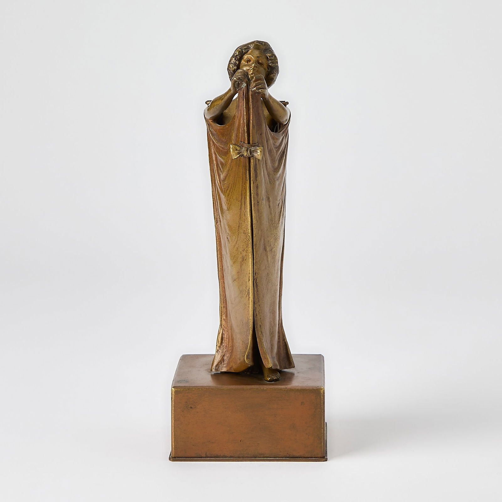Carl Kauba Vienna Patinated Bronze Metamorphic Erotic Figure of a Young Woman With Cape: Entitled "Open Sesame," circa 1915-20 Modeled in a standing pose, her articulated arms opening wide to reveal her nude body, on a square pedestal base, inscribed C. Kauba. Height overall 8 1/8 inches,