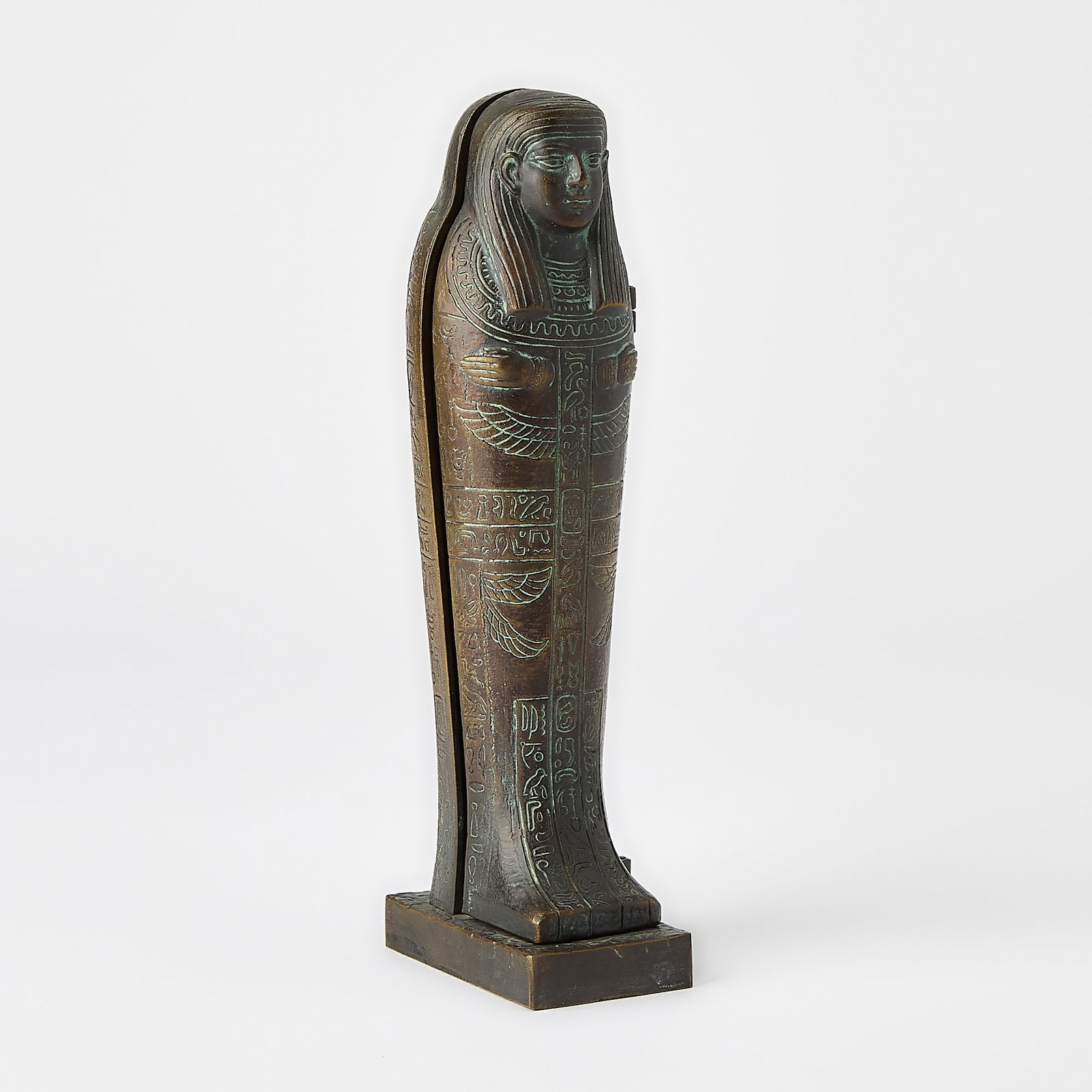 Franz Bergman Art Deco Vienna Gilt and Patinated Bronze Metamorphic Erotic Group: In the form of an Egyptian Mummy Sarcophagus, circa 1922-30 The upright wood-grained sarcophagus with a hinged door opening to reveal a nude young woman inside with her hands crossed over her chest, i