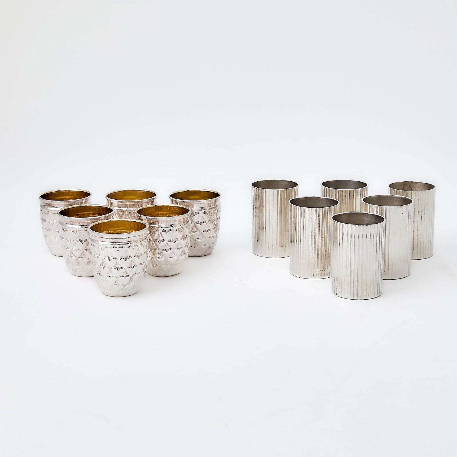 Set of Six Pampaloni Sterling Silver Shot Cups: Late 20th centuryHeight 2 7/8 inches; Together with a Set of Six Mexican Sterling Silver Reeded Cordials, height 2 1/8 inches, total approximately 16 ounces.