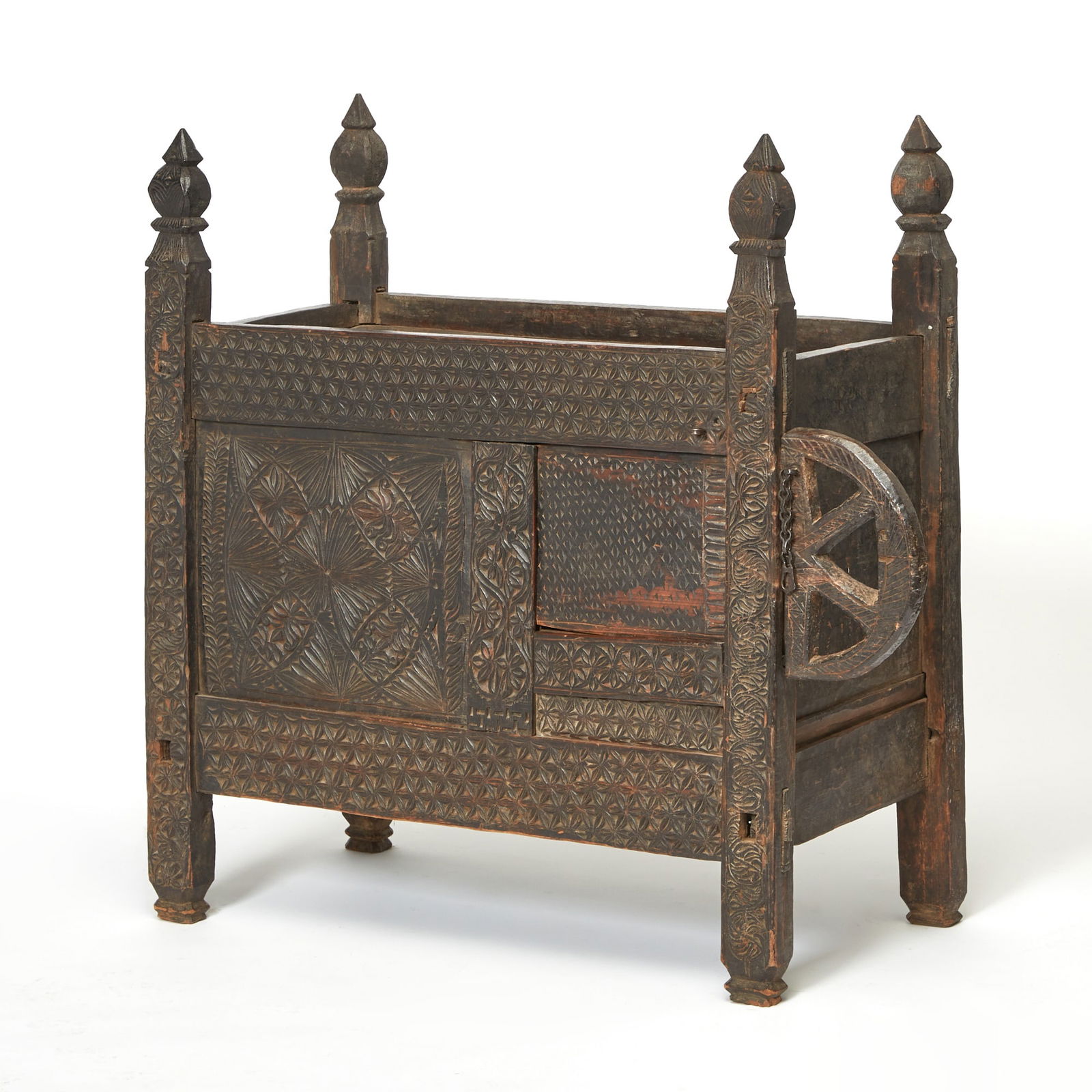 Carved Wood Dowry Chest: Northern Pakistan, 19th century Height 44 inches, width 47 1/2 inches, depth 19 1/2 inches. damage to feet; losses; old marks and scratches