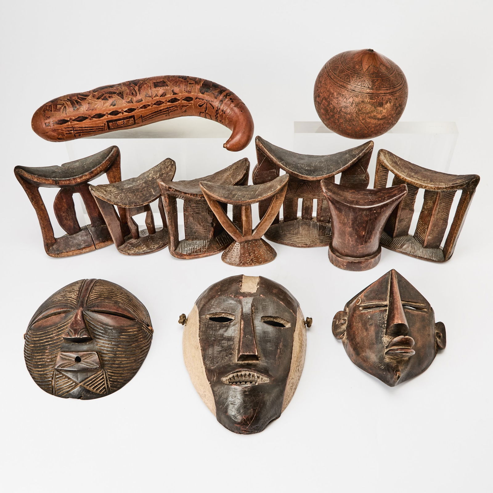 Group of Three African Carved Wood Masks Together with Six African Wood Headrests (1 of 5)