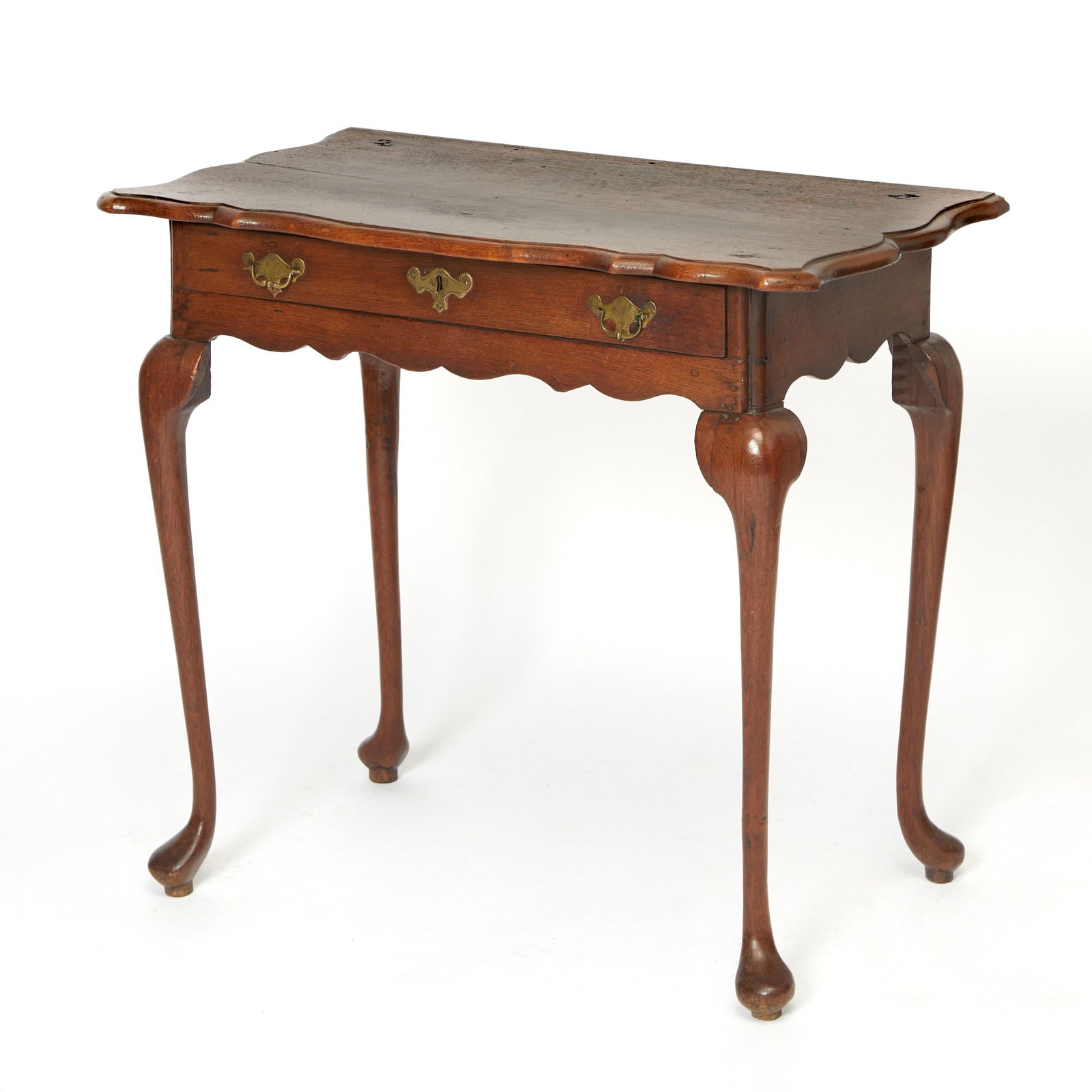Queen Anne Style Oak Dressing Table: Height 28 3/4 inches, width 33 inches, depth 19 inches. patched holes; repairs to legs; stains to top; cracks throughout