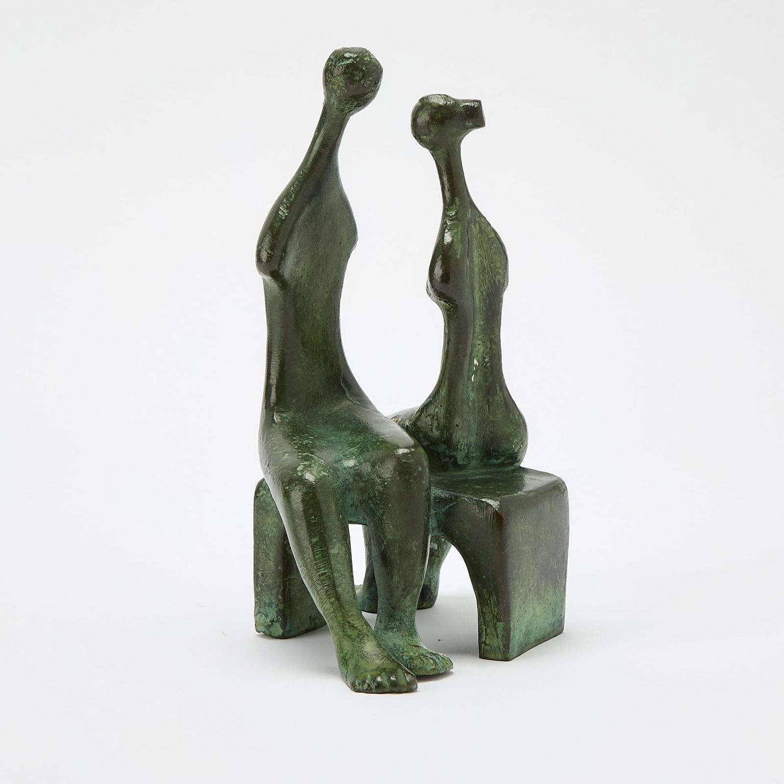 Patinated Bronze Group of Two Seated Figures: Green patina, signed indistinctly on the reverse. Height 8 inches, length 6 inches, depth 5 1/2 inches.