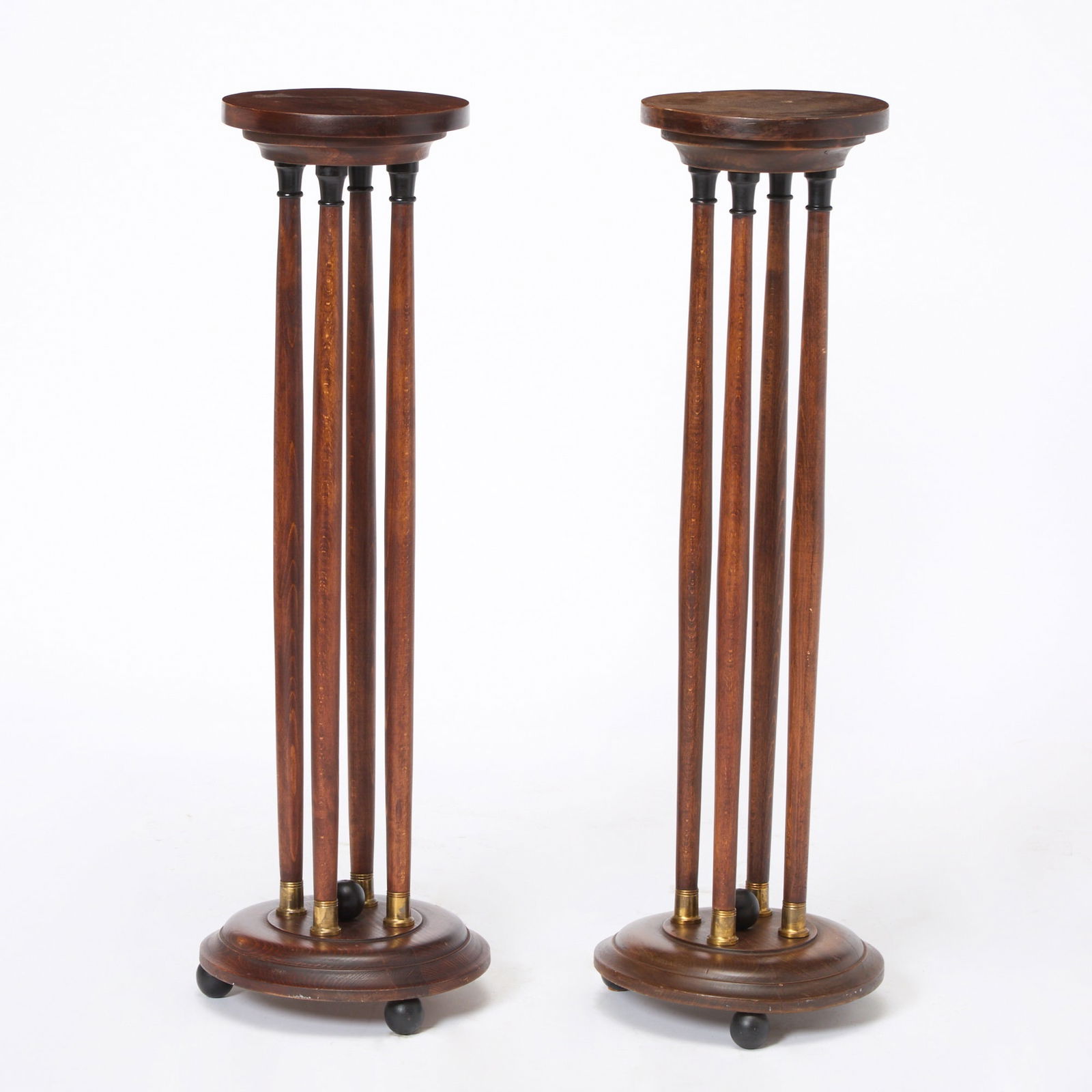 Pair of Art Deco Style Beechwood Pedestals: Late 20th centuryWith gilt-metal mounts. Height 40 inches, diameter 12 1/2 inches 