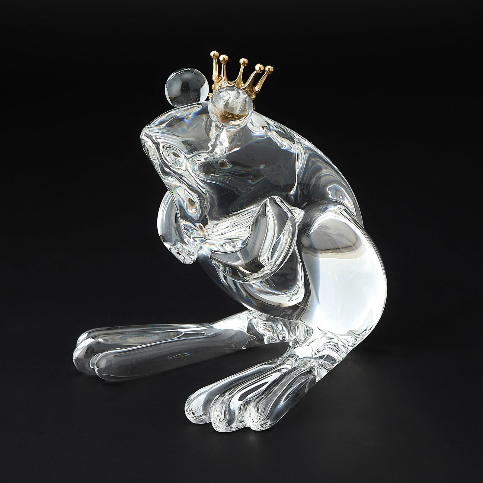 Steuben 18K Gold-Mounted Glass Figure Titled The Frog Prince: Designed by Lloyd Atkins, circa 1973 Height 6 1/2 inches, width 5 1/2 inches. generally good condition
