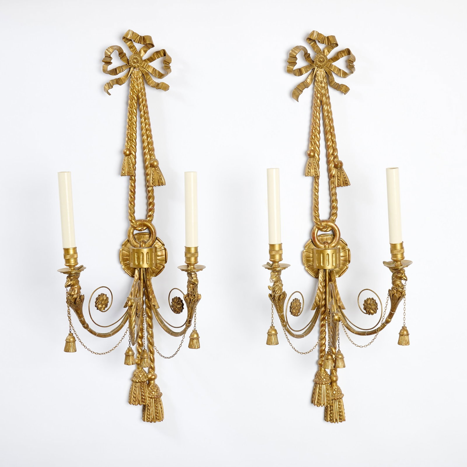 Pair of George III Style Giltwood and Metal Two-Light Wall Lights: Height 34 inches, width 13 inches, depth 10 inches.