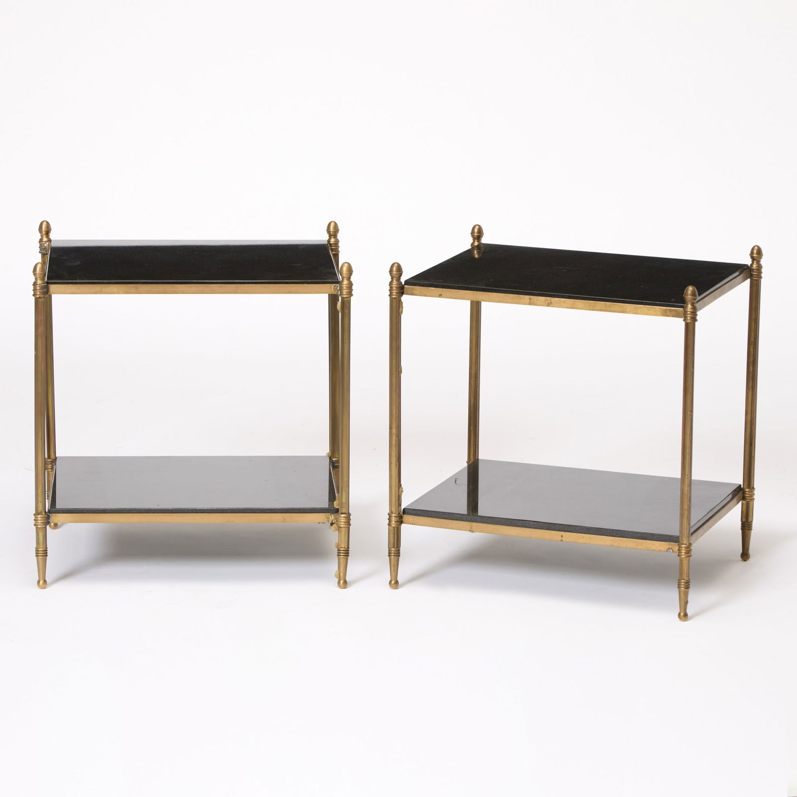 Pair of Brass and Black Granite Two-Tier Low Tables: Height 20 1/4 inches, width 19 1/2 inches, depth 15 1/2 inches. generally good condition; minor wear[