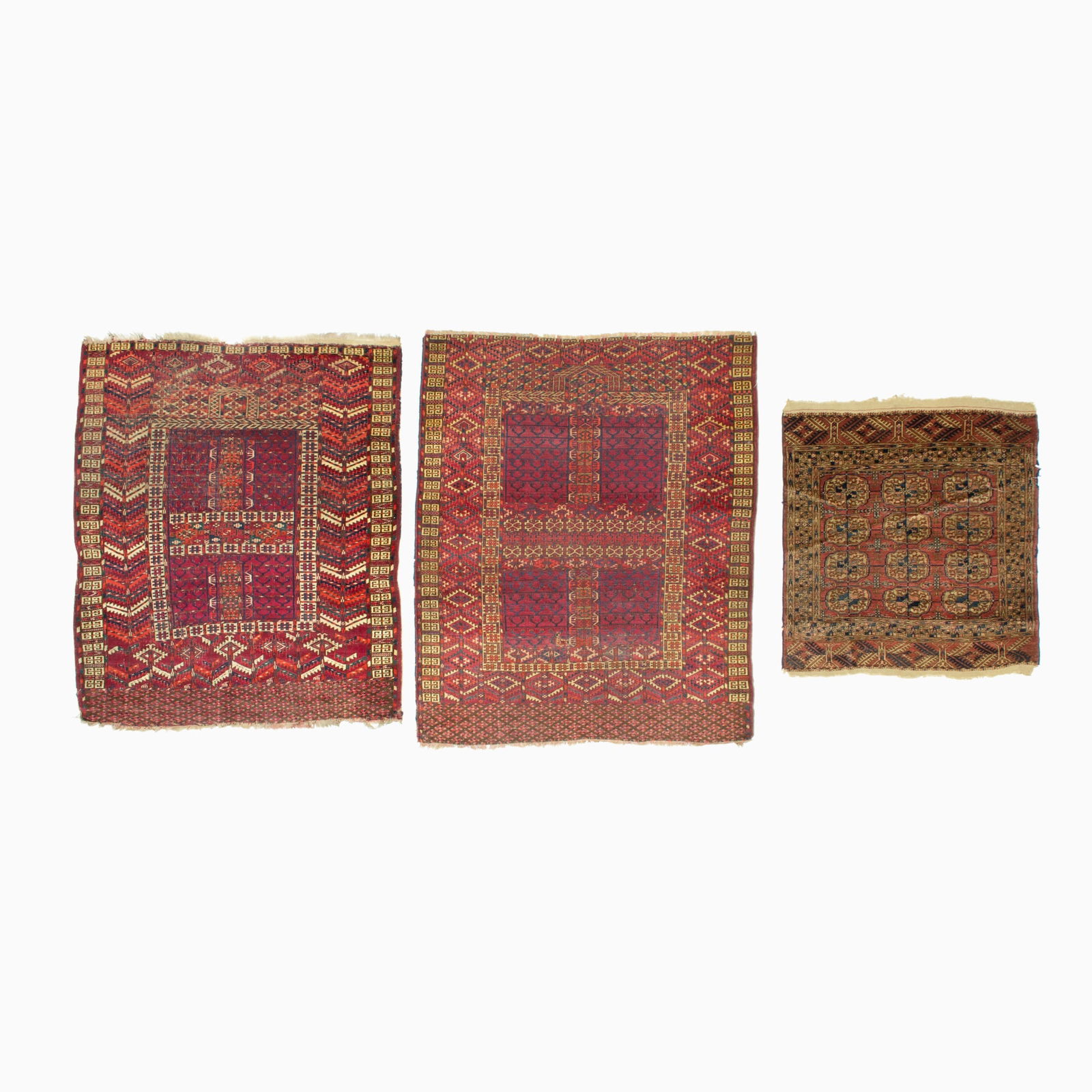 Three Tekke Rugs: West Turkestan, Early 20th CenturyTwo Tekke Ensi rugs together with a Tekke rug (5' 0" x 4' 3", 5' 0" x 4' 3", and 3' 3" x 3' 3" respectively) Tekke Ensi - Areas of wear, partial ends, small