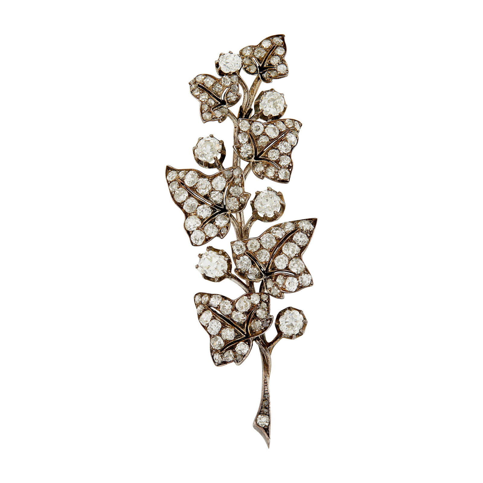 Antique Silver, Gold and Diamond Leaf Brooch: 6 old-mine cut diamonds ap. 1.90 cts., old mine-cut diamonds ap. 3.25 cts., rose-cut diamonds, ap. 8 dwts. Tests as 14 kt. Diamonds: H-I-J-K-VS-SI 2 7/8 x 1 inches.