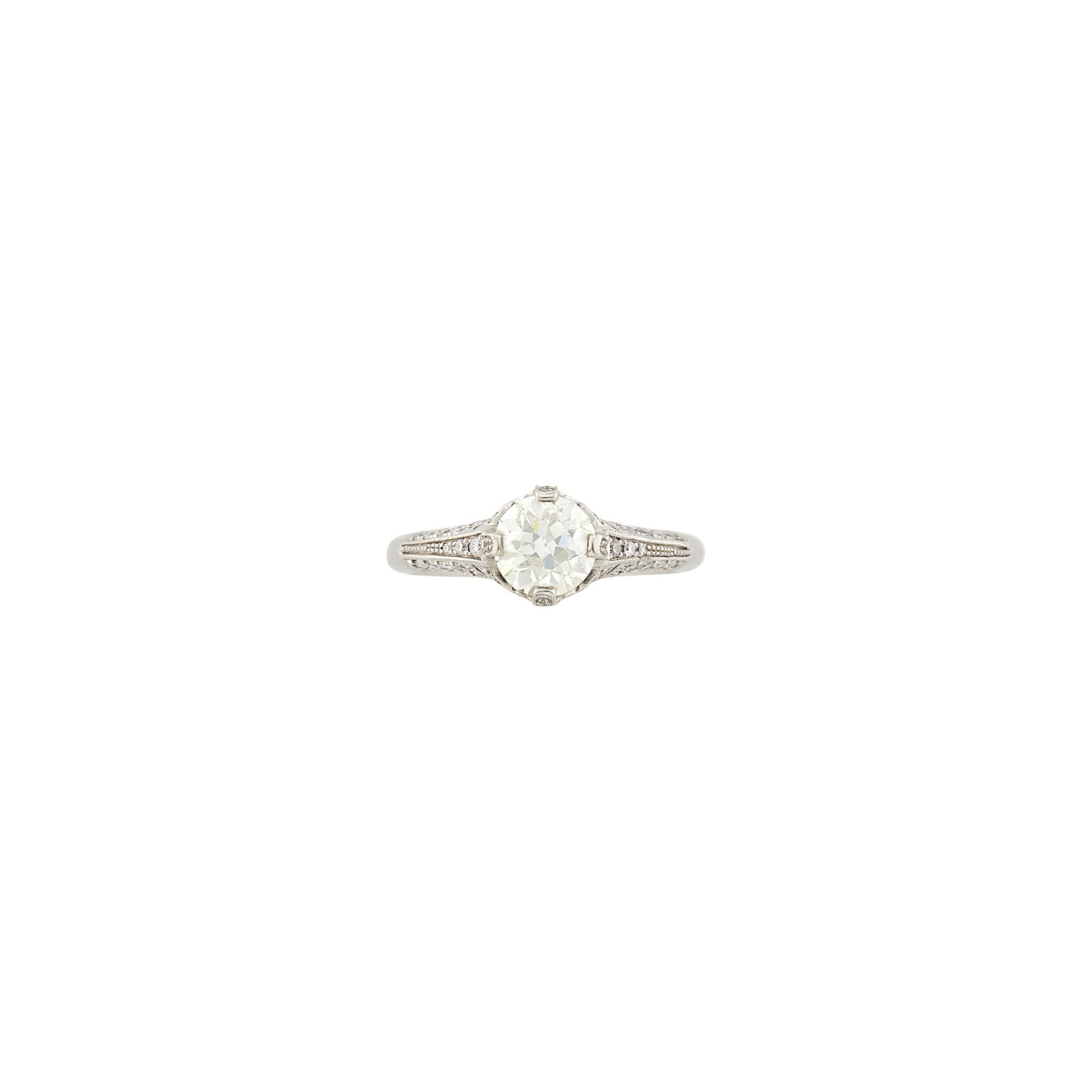 Platinum and Diamond Ring: One old European-cut diamond ap. 1.25 cts., small round diamonds, ap. 4.3 dwts. Size 8 1/2. Center diamond: L-M-VS, faint fluorescence. Diamonds: G-H-VS. Width 1/4 inch.