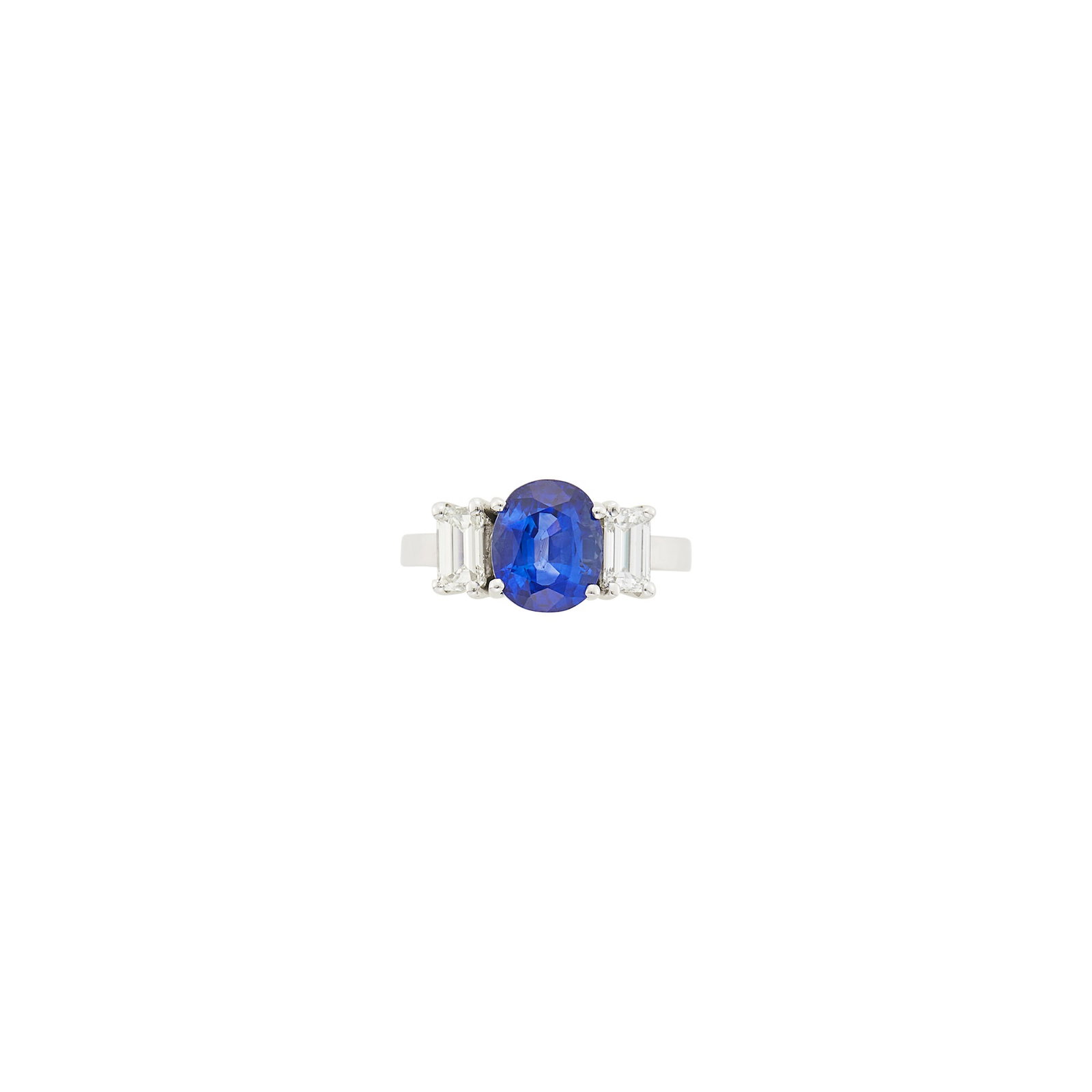 White Gold, Sapphire and Diamond Ring: 14 kt., one oval sapphire weighing 4.09 cts., 2 emerald-cut diamonds ap. 1.00 ct., ap. 3.7 dwts. Size 5 3/4. With GIA report no. 22358876034 stating Heated. Sapphire: bright medium deep blue, some ba