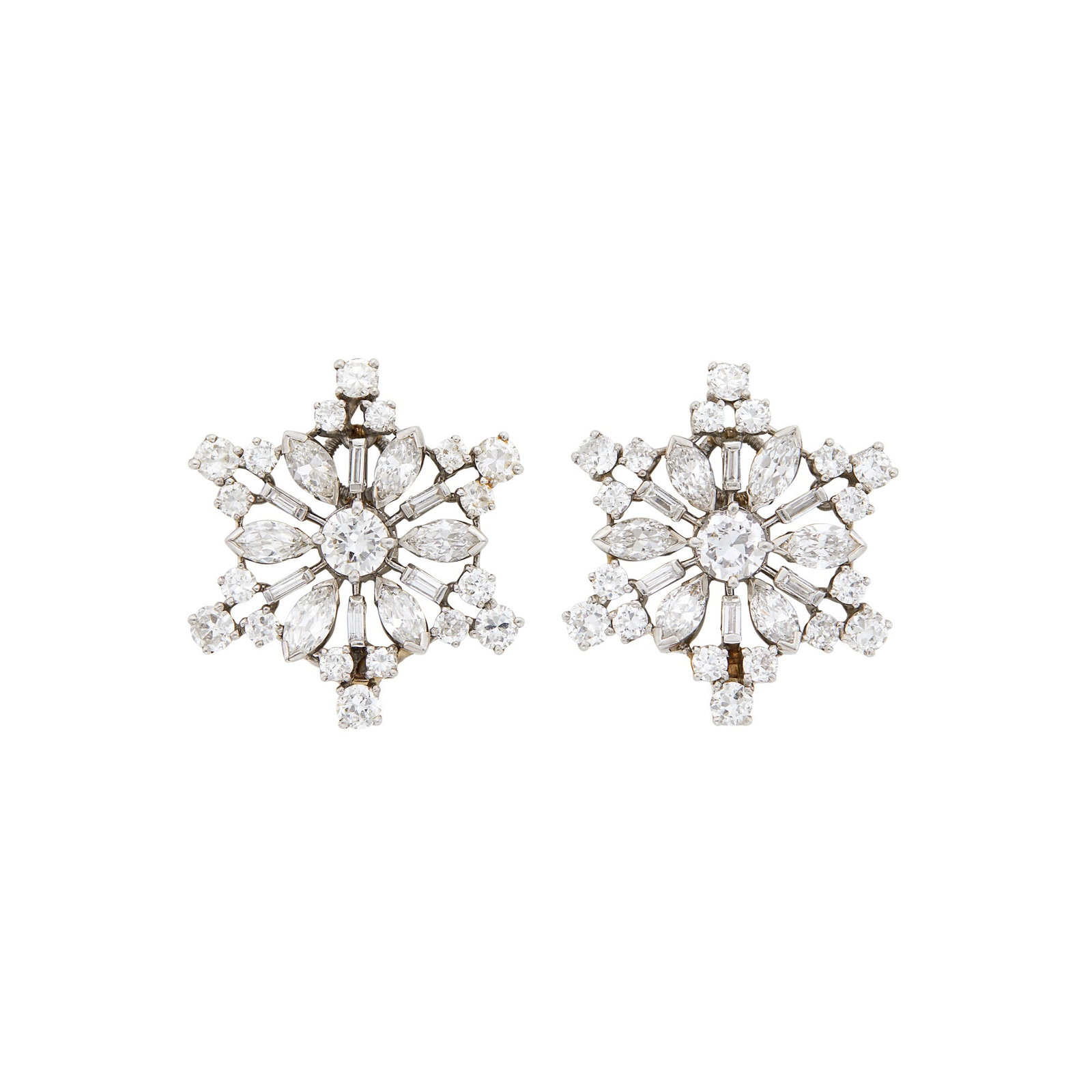 Pair of White Gold and Diamond Snowflake Earclips: 2 old European-cut diamonds ap. .90 ct., 36 round, 12 marquise-shaped and 12 baguette diamonds ap. 4.50 cts., ap. 8.2 dwts. Tests as 18 kt. Diamonds: G-H-I-VS, several SI Clip-backs. Diameter 15/16 i