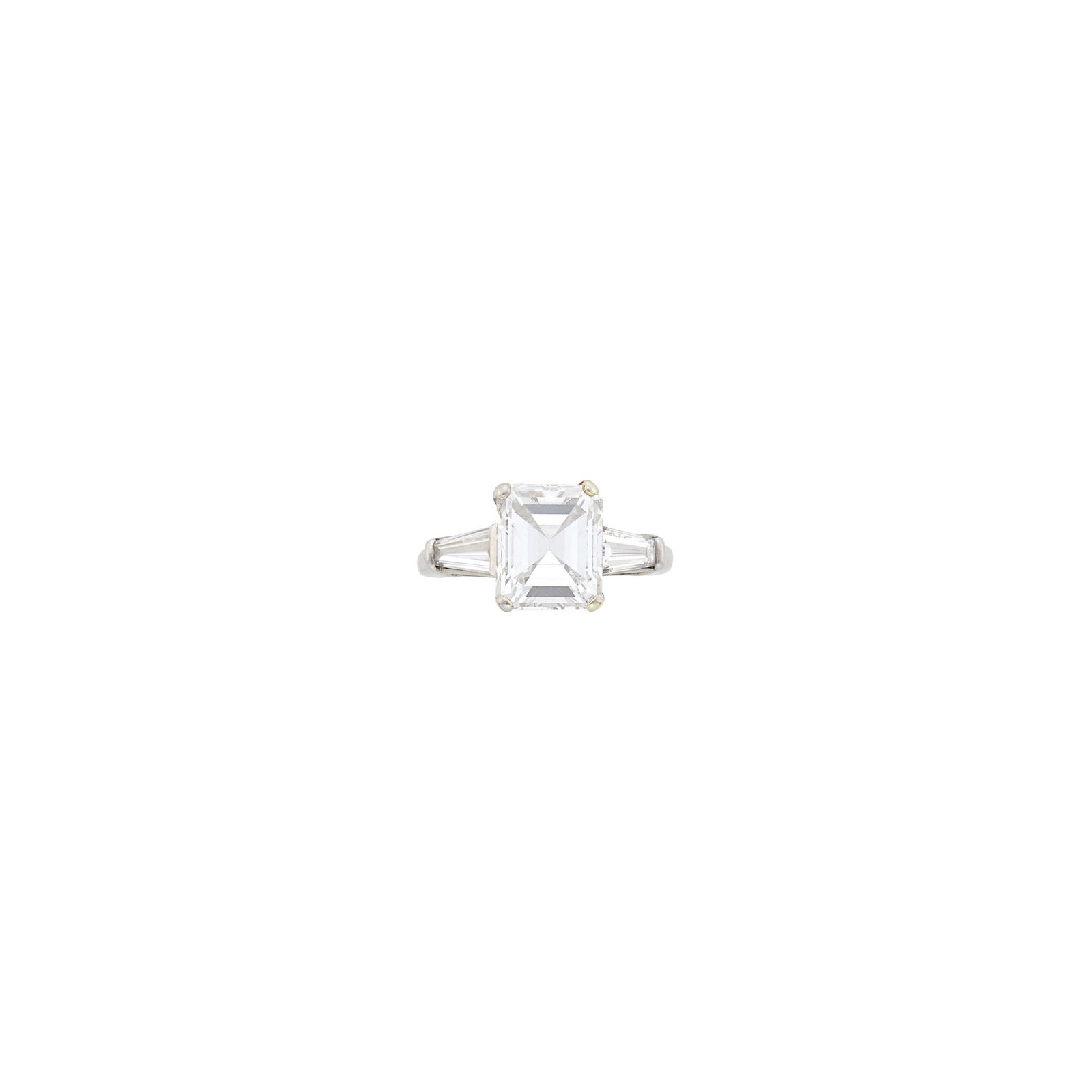 Platinum and Diamond Ring: One emerald-cut diamond weighing 2.42 cts., 2 tapered baguette diamonds. Size 2 1/2.