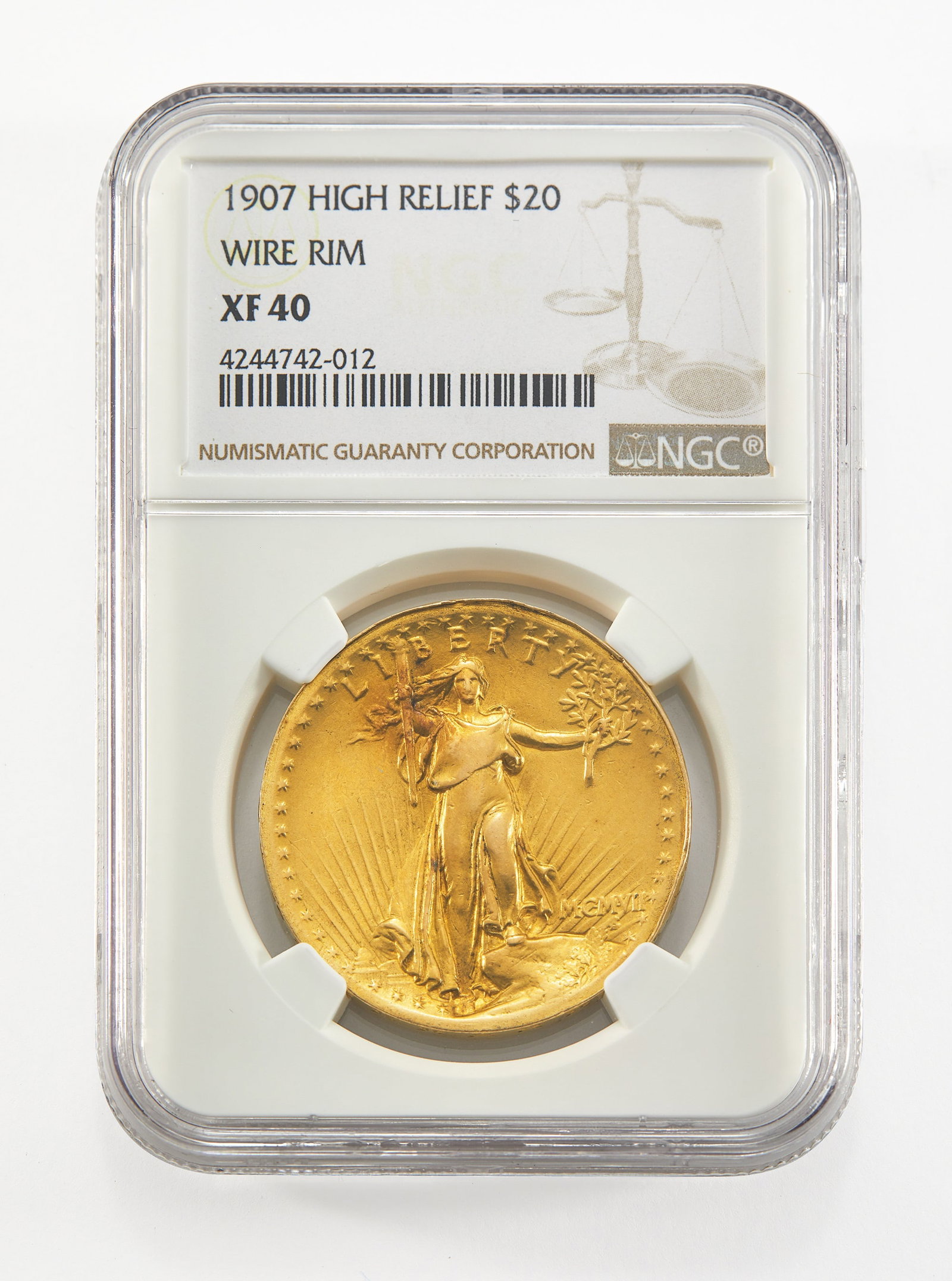 United States. 1907 High Relief Double Eagle, Wire Rim. NGC XF-40.: A solid example of one of the most sought-after United States coins. In some ways the poster child of the Renaissance of American Coinage initiated by President Theodore Roosevelt at the outset of the