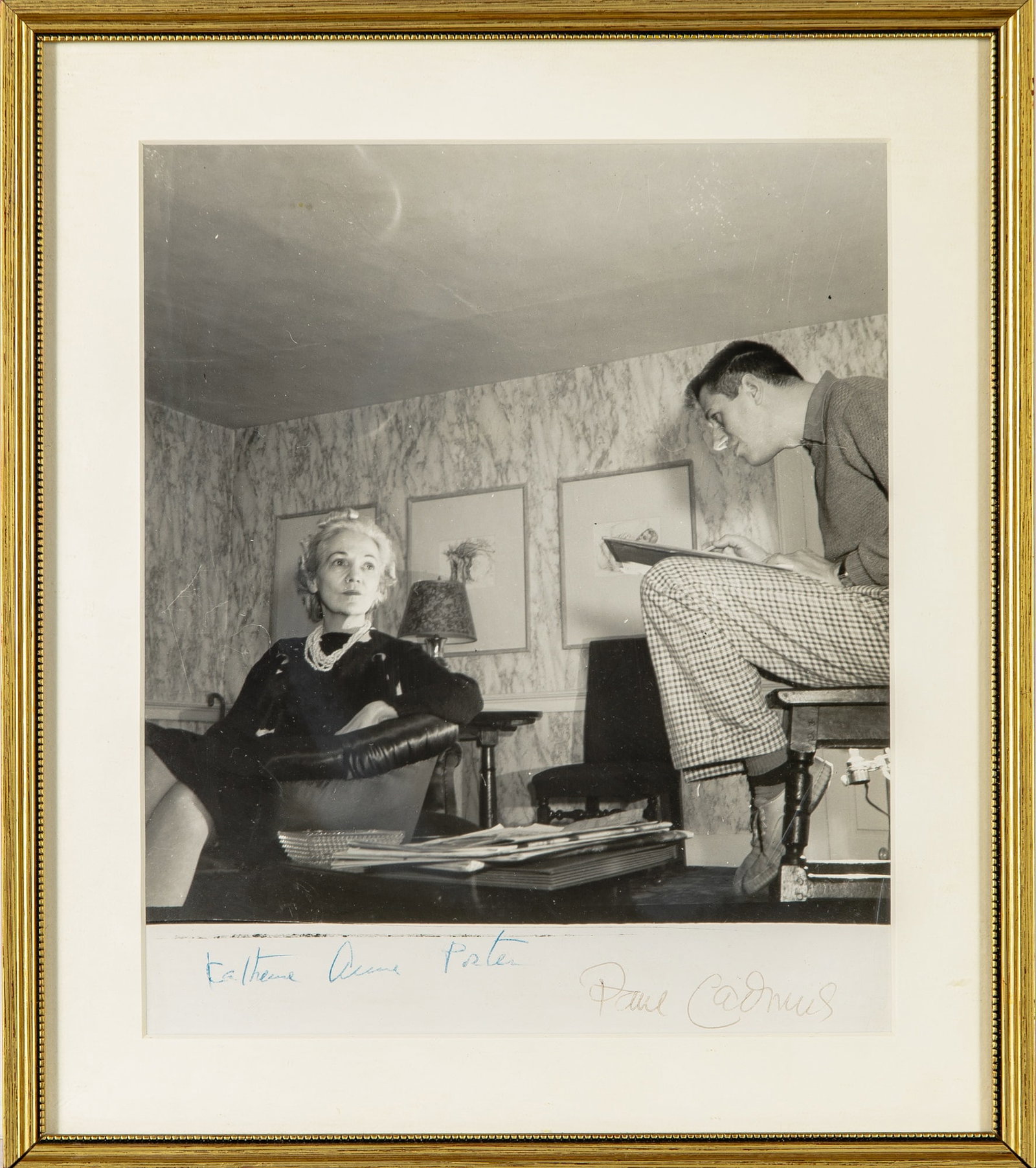 Photograph signed by Katharine Anne Porter and Paul Cadmus.: LYNES, GEORGE PLATT Paul Cadmus drawing Katherine Anne Porter, 1930s, likely vintage. Gelatin silver print, 8 1/8 x 7 3/4 inches (20.75 x 19.75 cm) on larger sheet, s