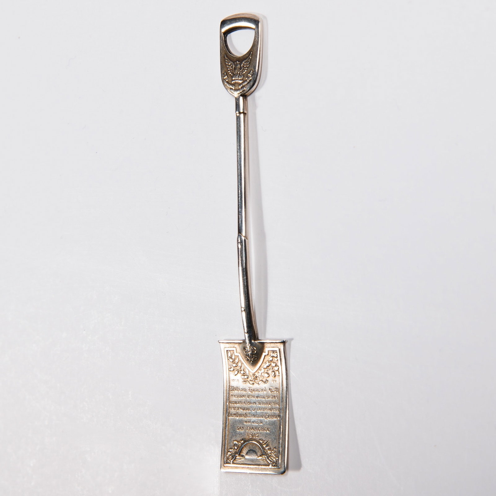 Sterling replica shovel: [EXPOSITION] Rare 1915 Shreve & Co sterling silver spade shovel commemorating the groundbreaking of the Panama Canal. 4” length; hallmarked PAT APPD FOR backside; front reads USED BY William