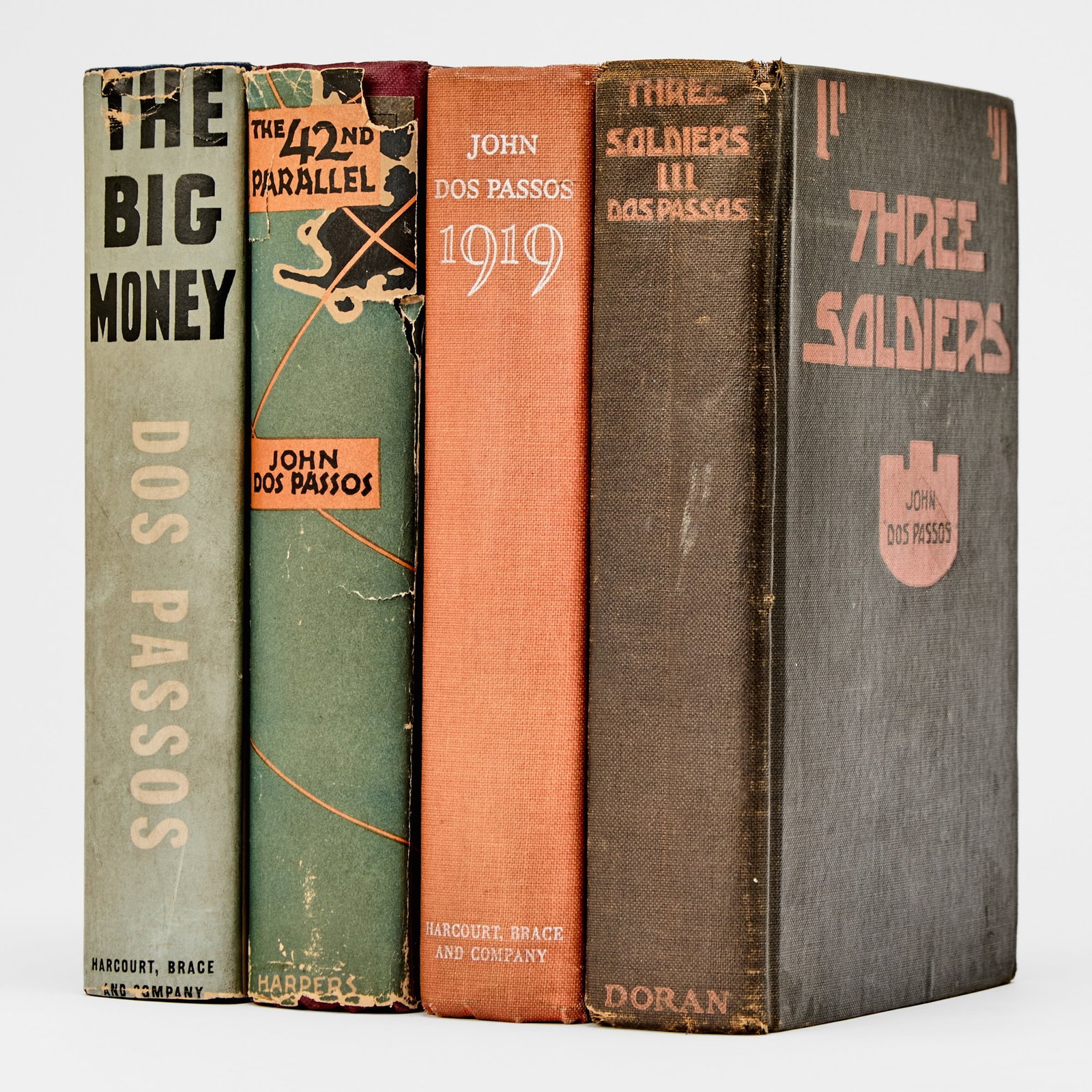 Four John Dos Passos first editions: DOS PASSOS, JOHN The 42nd Parallel. New York: Harper & Brothers, 1930. First edition. Pub