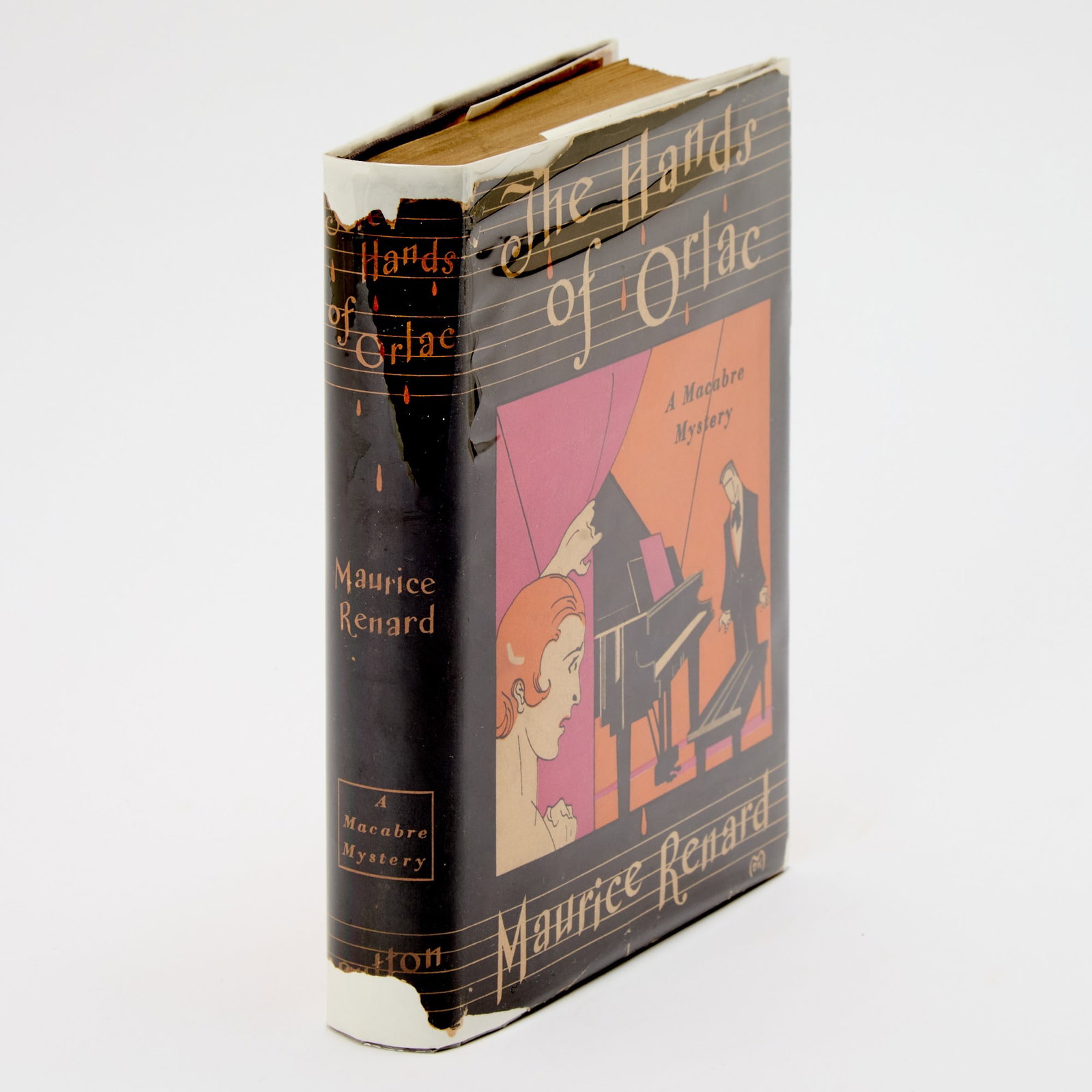 Renard, Hands of Orlac: RENARD, MAURICE The Hands of Orlac. New York: Dutton, [1929]. First edition. Publisher's purple cloth stamped in orange, in pictorial dust jacket. Slight lean, spine ends darkened and minor wear to c