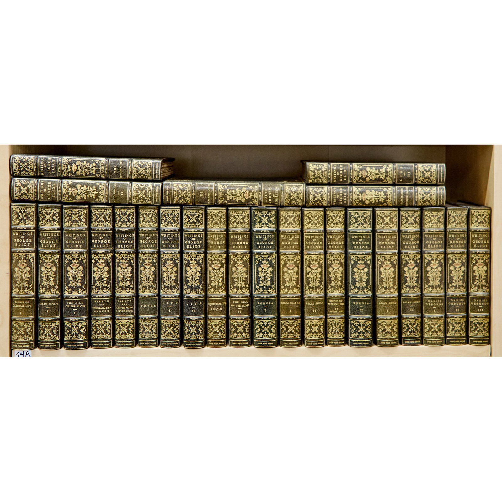 A finely bound set of George Eliot's writings: [FINE BINDING] ELIOT, GEORGE. The Writings of George Eliot. Boston and New York: Houghton Mifflin Company, 1908. 25 volumes. Limited edition, number 646 of 750 copies of the "Large-Paper Edi