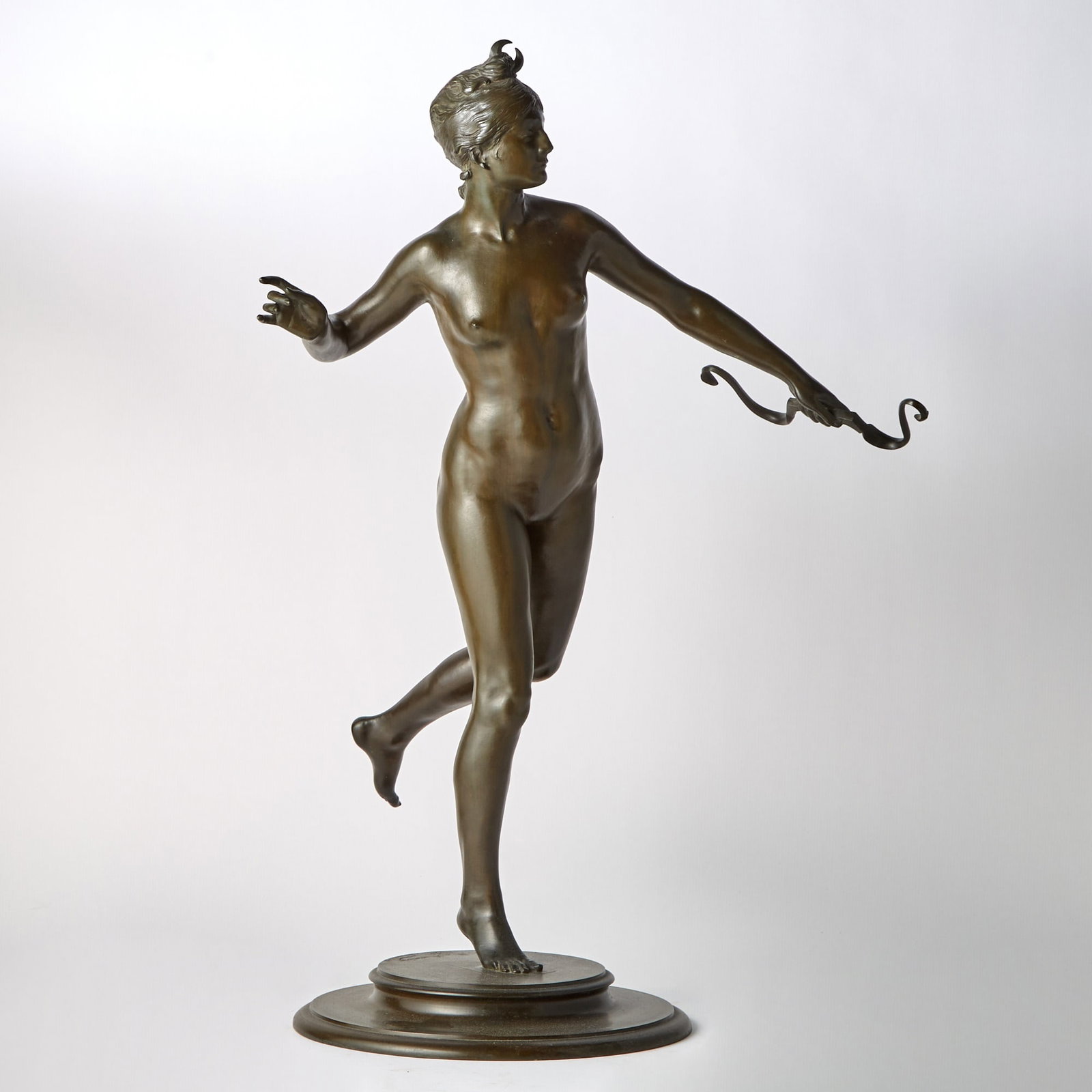 Frederick William MacMonnies: American, 1863-1937Diana, 1890Inscribed F. MacMonnies 1890 copyright 1894Bronze with a deep olive patinaHeight 30 1/2 inches ProvenancePrivate Collection, New Jersey, circa 1935S