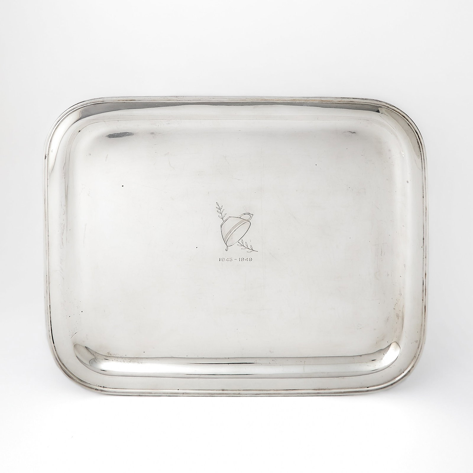 Hollywood Interest: Tiffany & Co. Sterling Silver Tray from the Estate of George Burns: 1940s Rectangular with molded rim, the center engraved with the Maxwell House Coffee logo and 1945-1949. Length 18 1/4 inches, approximately 60 ounces. Provenance: Sotheby's Los Angeles, October 10, 1