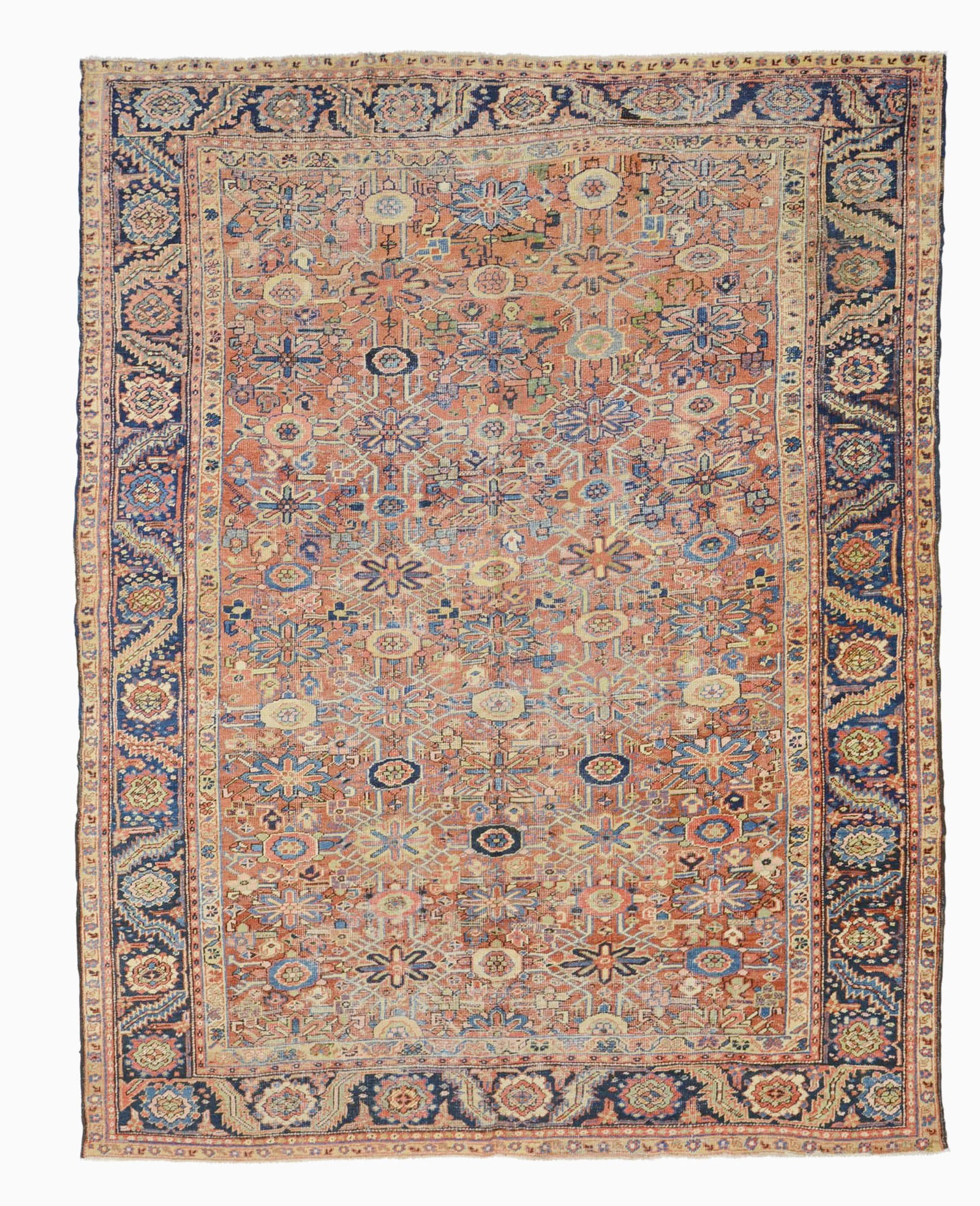 Heriz Carpet: Northwest Persia, circa 1930The allover polychrome Mina Khani pattern on the madder field is within an indigo rosette and serrated leaf border. (9' 9" x 7' 9") Worn and tinted areas throughout,