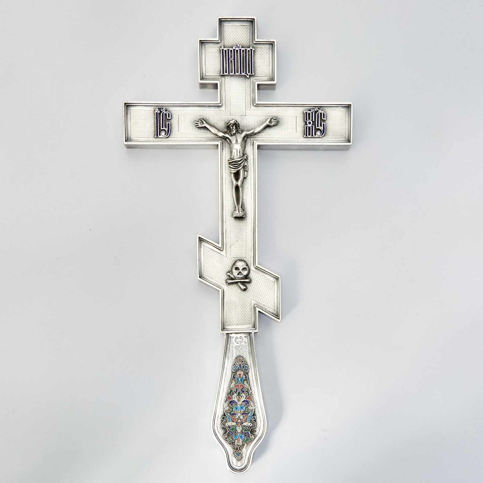 Russian Silver and Cloisonné Enamel Cross: Maker's mark ПП, Moscow, 1899-1908The reverse inscribed in Russian with the Troparion to the Cross, one side engraved with a dedication: