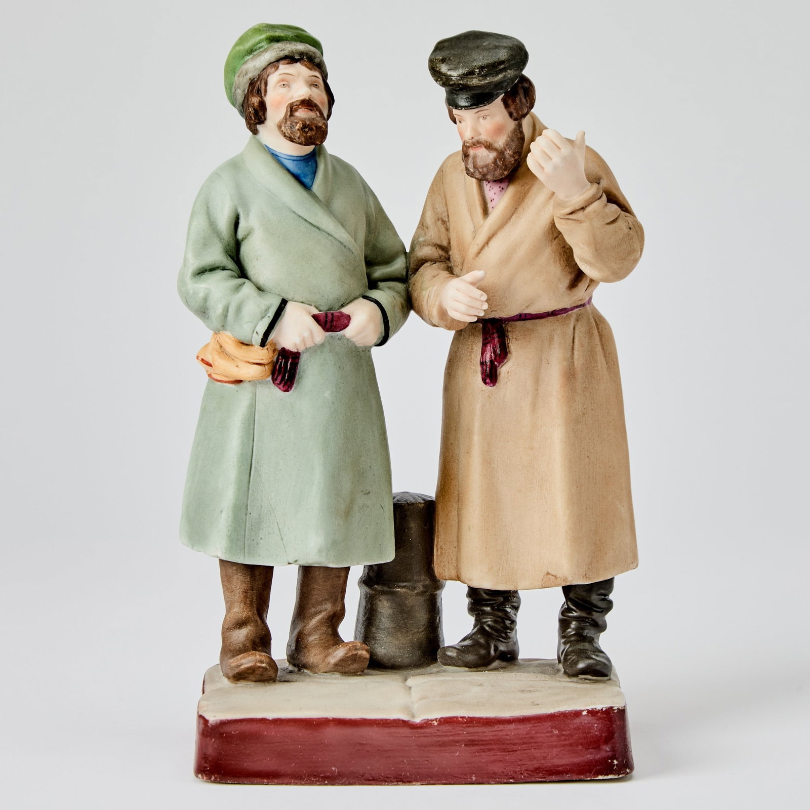 Russian Porcelain Group of Newly Arrived Peasants: Gardner Manufactory, Verbilki, 1870-1890 Height 8 1/2 inches (22 cm). Another version of this model is illustrated in Gardner: XVIII - XIX: Porcelain Plastic Arts from Private Collections & Mosco