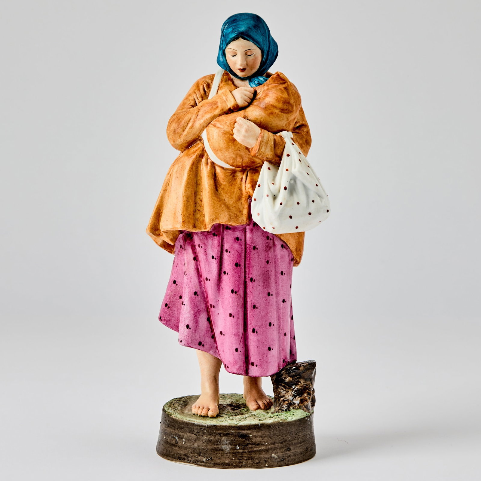 Russian Porcelain Figure of a "Bitter Lot": Gardner Manufactory, Verbilki, 1870-1890 Height 9 1/2 inches (24 cm). Another version of this model is illustrated in Gardner: XVIII - XIX: Porcelain Plastic Arts from Private Collections & Mosco