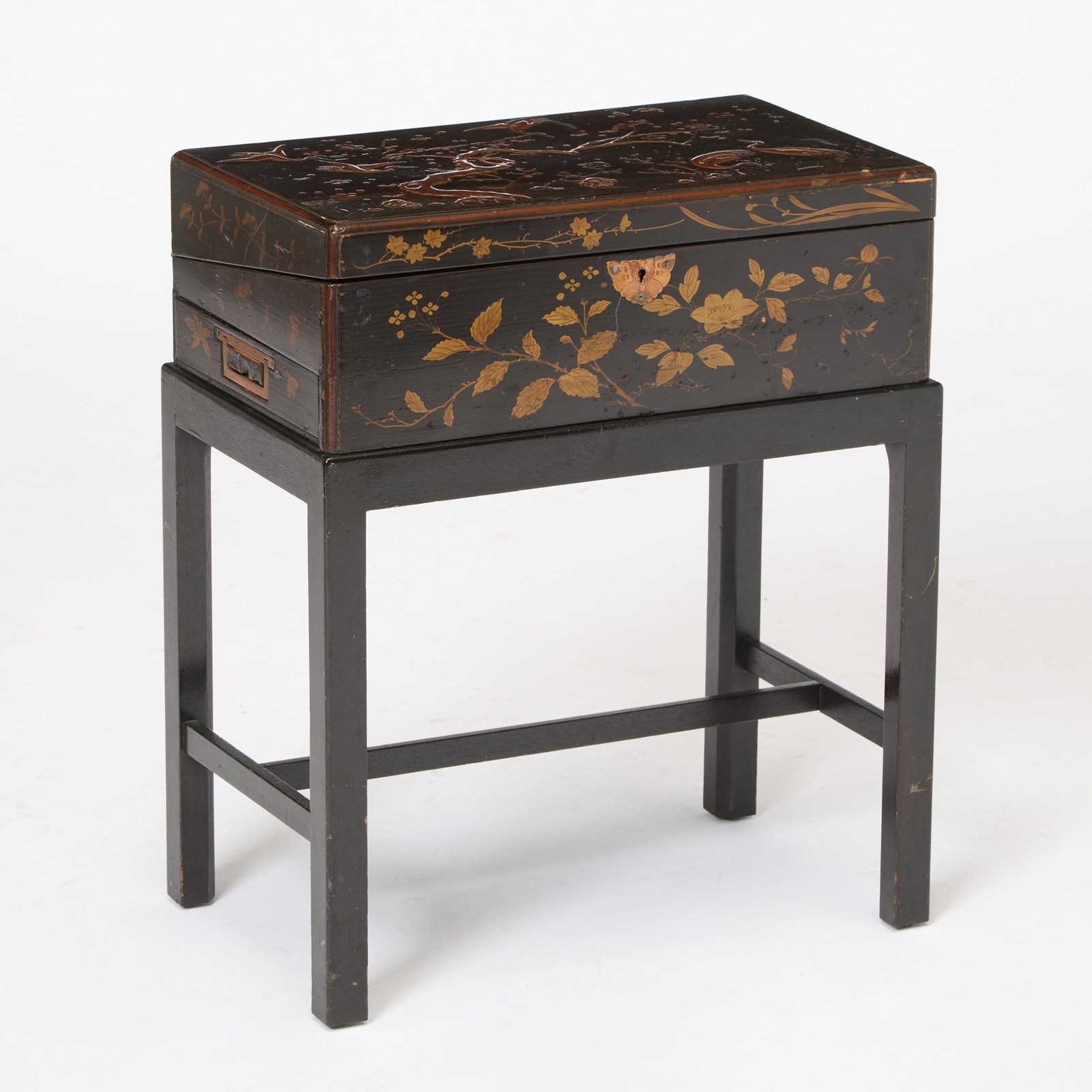 Chinese Export Gilt Decorated Black Lacquer Lap Desk: 19th Century Decorated with birds, trees and foliage, on a later stand. Height 20 inches, width 16 1/2 inches, depth 10 inches