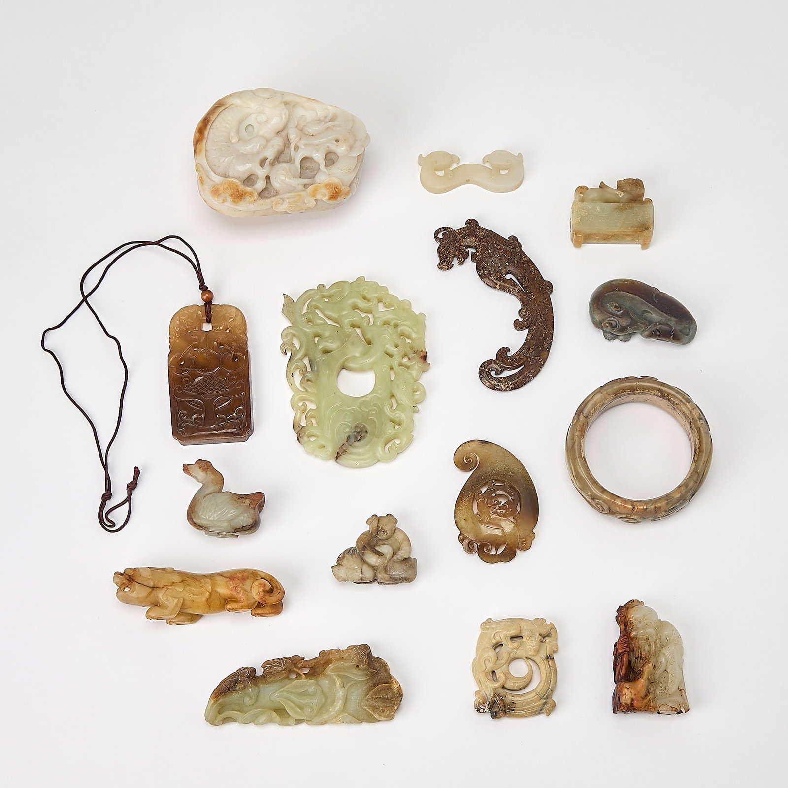 Group of Fifteen Chinese Archaistic and Pre-Qing Style Jade Carvings 20th Century (1 of 5)