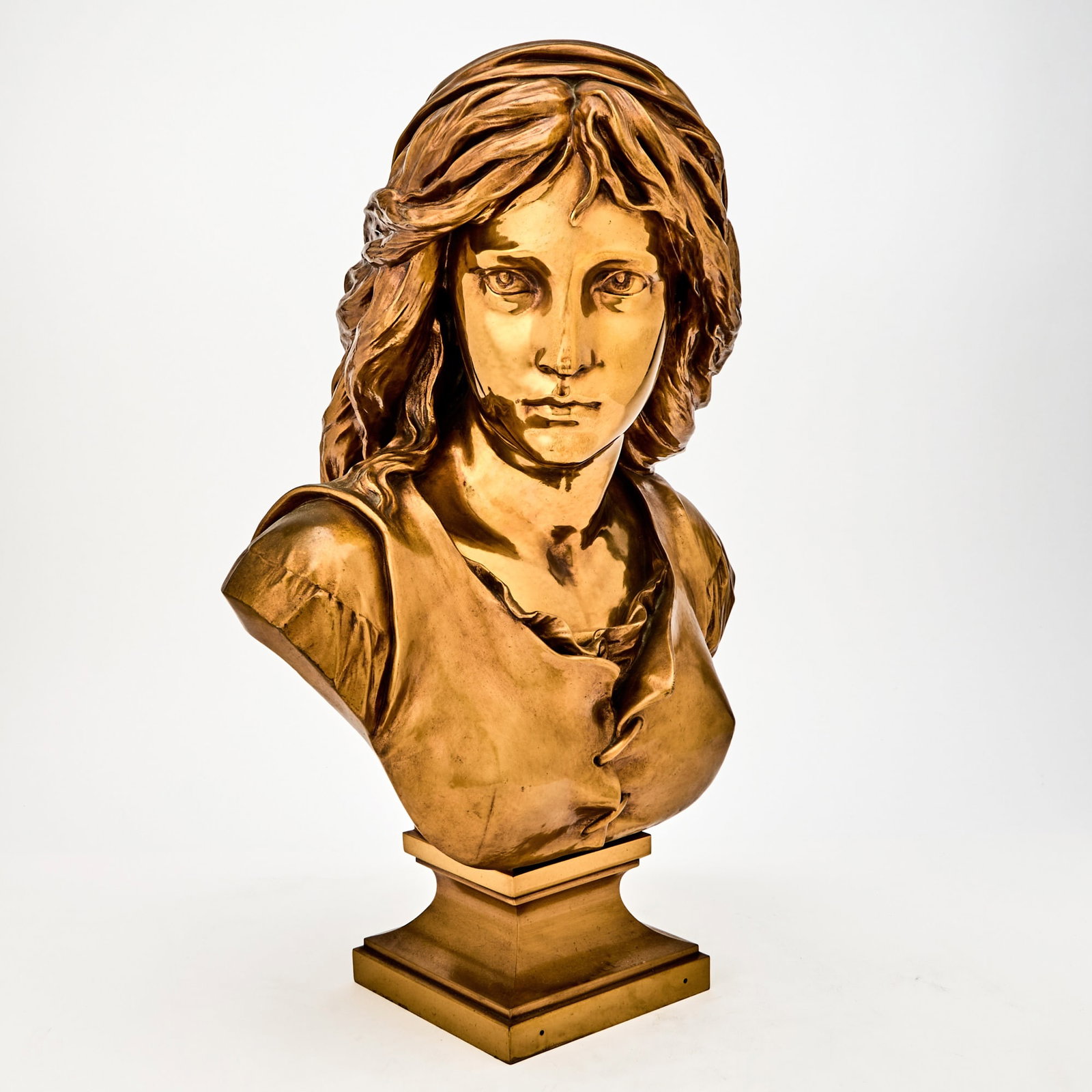 French Gilt and Polished Bronze Bust of a Woman: Height 23 inches.