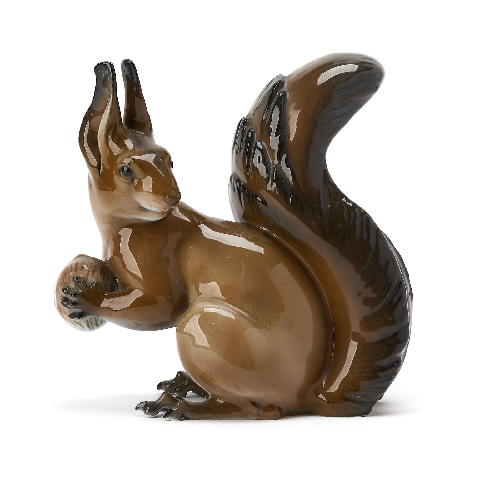 German Porcelain Squirrel Figure: Mark of Rosenthal, 1934-1956Designed by Theodor Kärner in 1934, model 1290, impressed and printed marks. Height 6 1/2 inches. repair to face 
