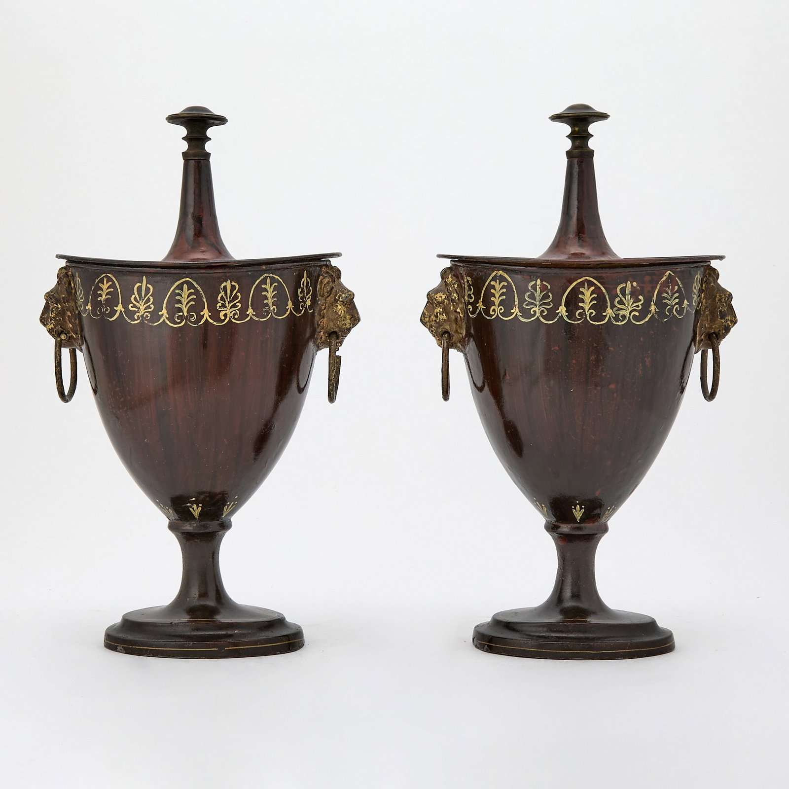 Pair of Regency Faux Wood Tole Urns and Covers: First half 19th century Height 12 inches.