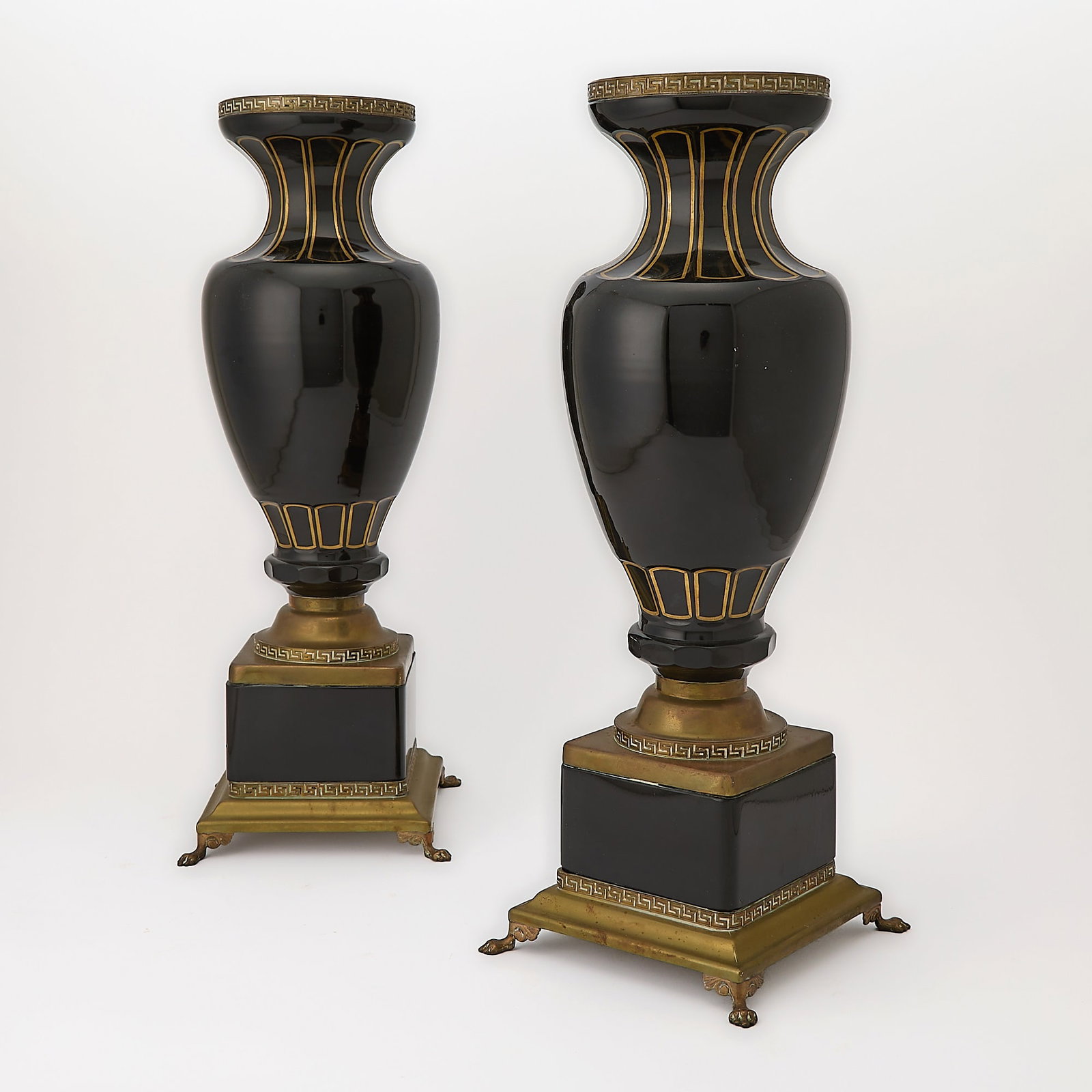 Pair of Continental Gilt-Decorated Black Glass Urns: Early 20th centuryHeight 19 1/2 inches.